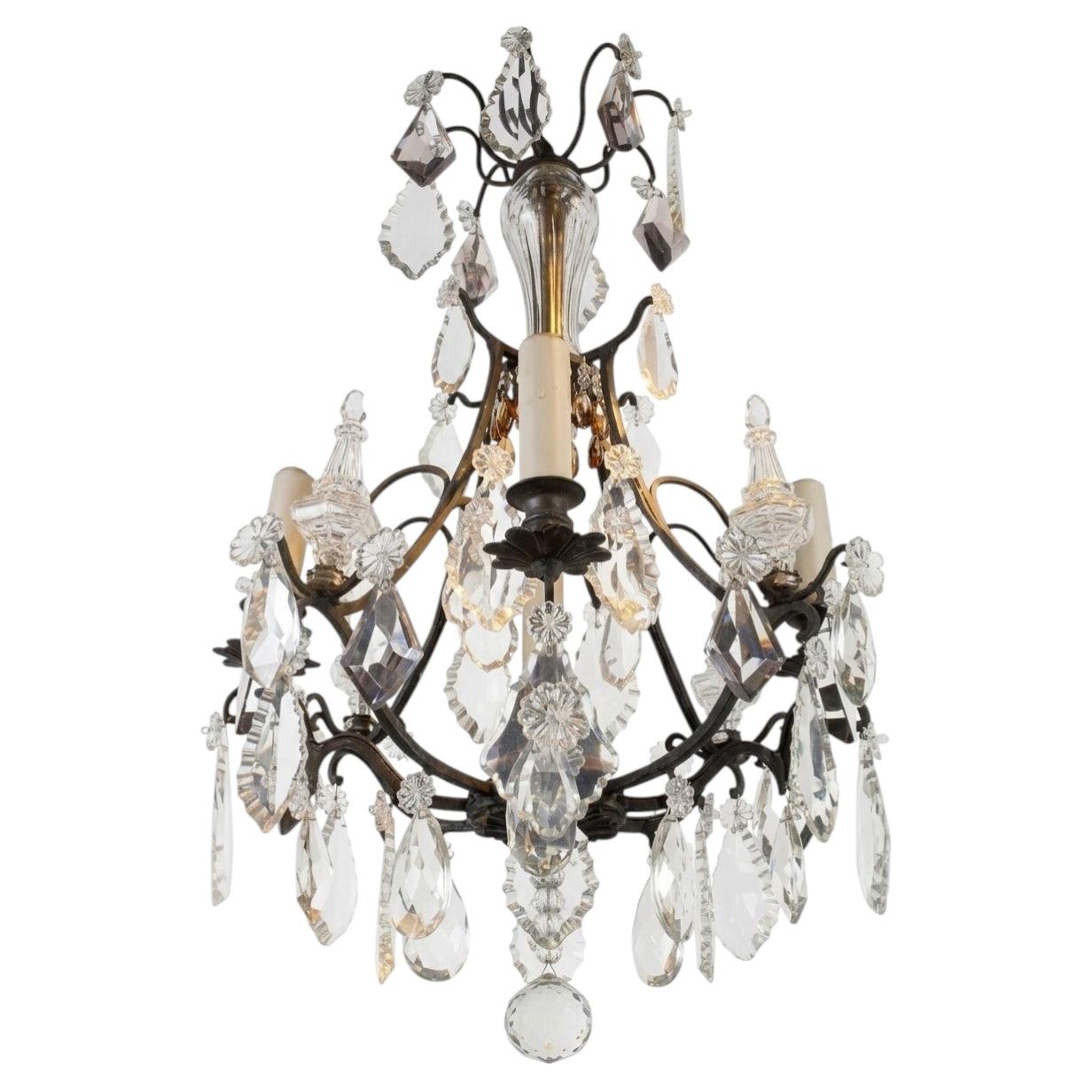 A very fine bronze and crystal Louis XV style "Cage" chandelier by Baccarat.