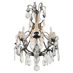 A very fine bronze and crystal Louis XV style "Cage" chandelier by Baccarat.