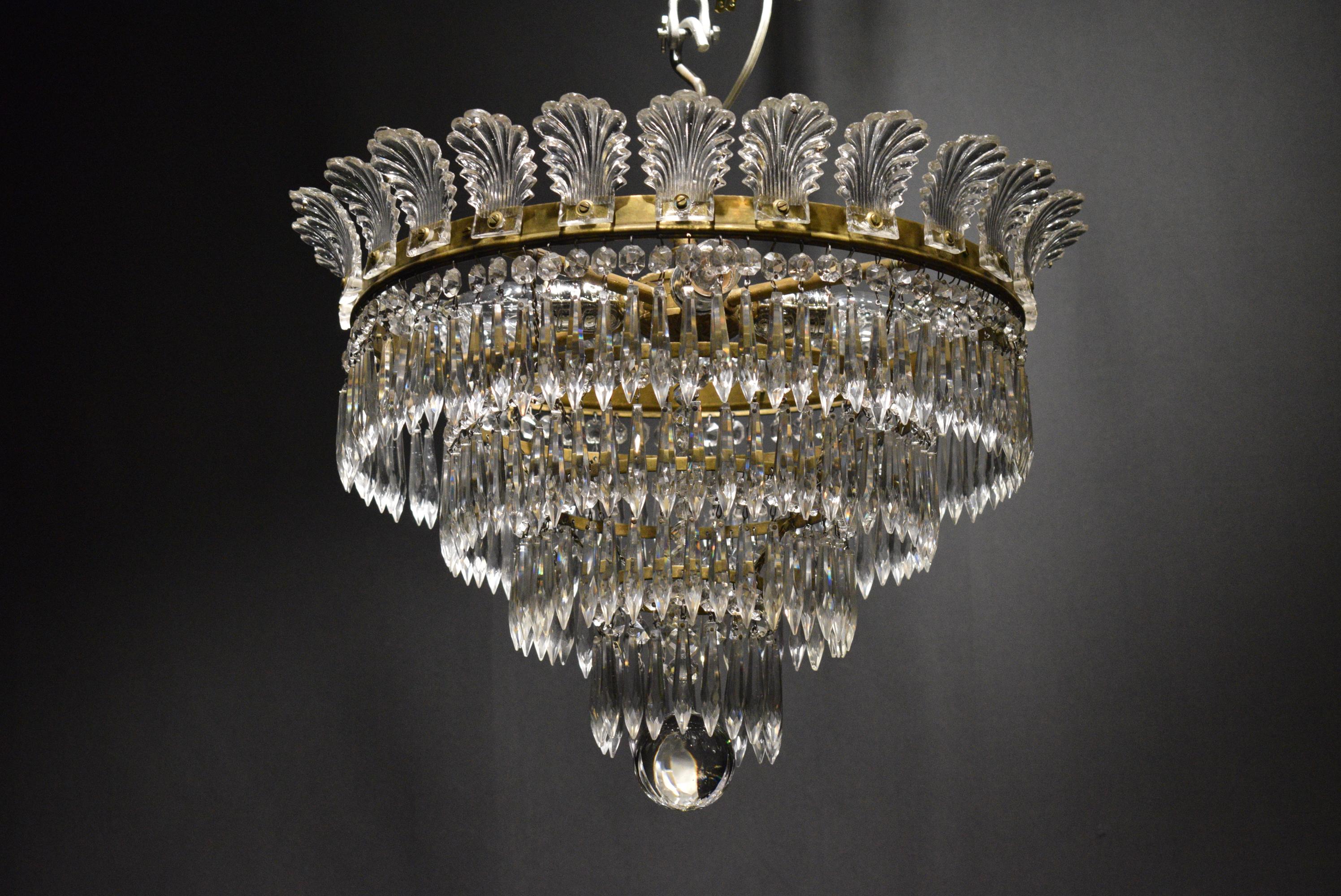 A very fine bronze and crystal pendant by Baccarat.
France, circa 1910. 4 lights
Dimensions: Height 14 1/2
