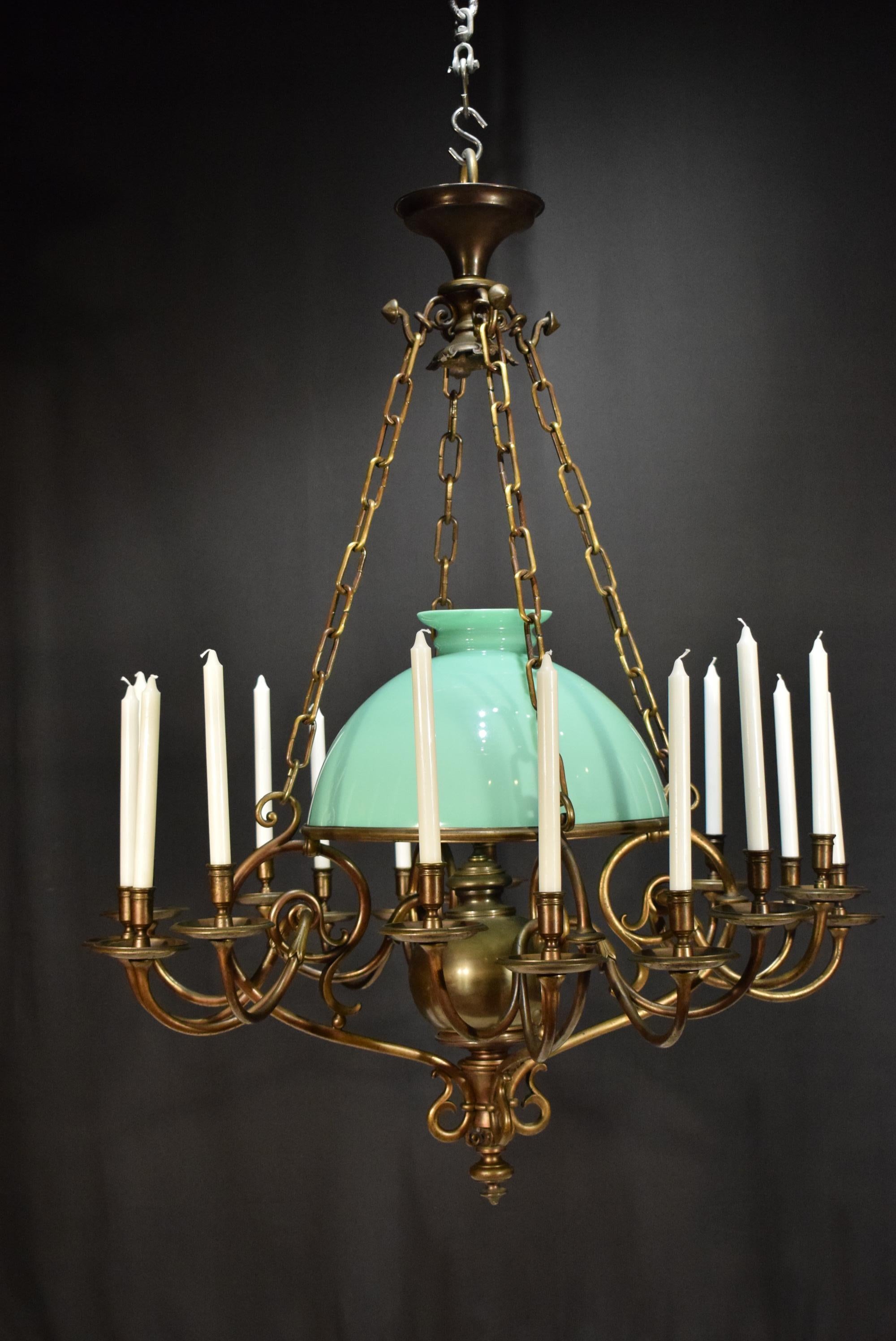 A very fine bronze chandelier with its original pale green shade. Originally for candles, has never been ever electrified. From a hunting lodge in Austria, circa 1900. A rare find.
Dimensions: Height 51