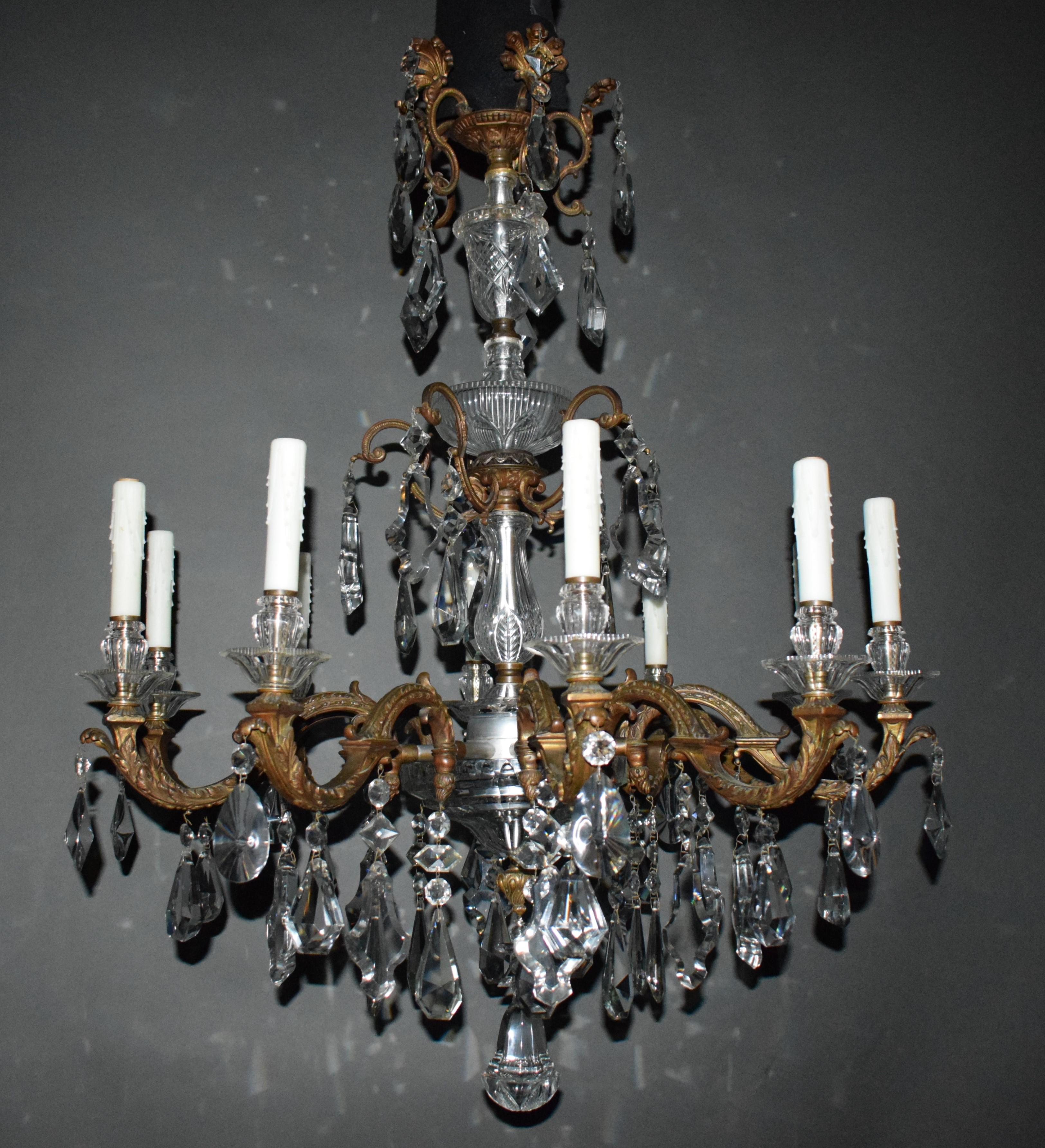 A very fine bronze & crystal chandelier featuring hand cut crystal pendalogues. 10 Lights.
England, circa 1910
NI1206.