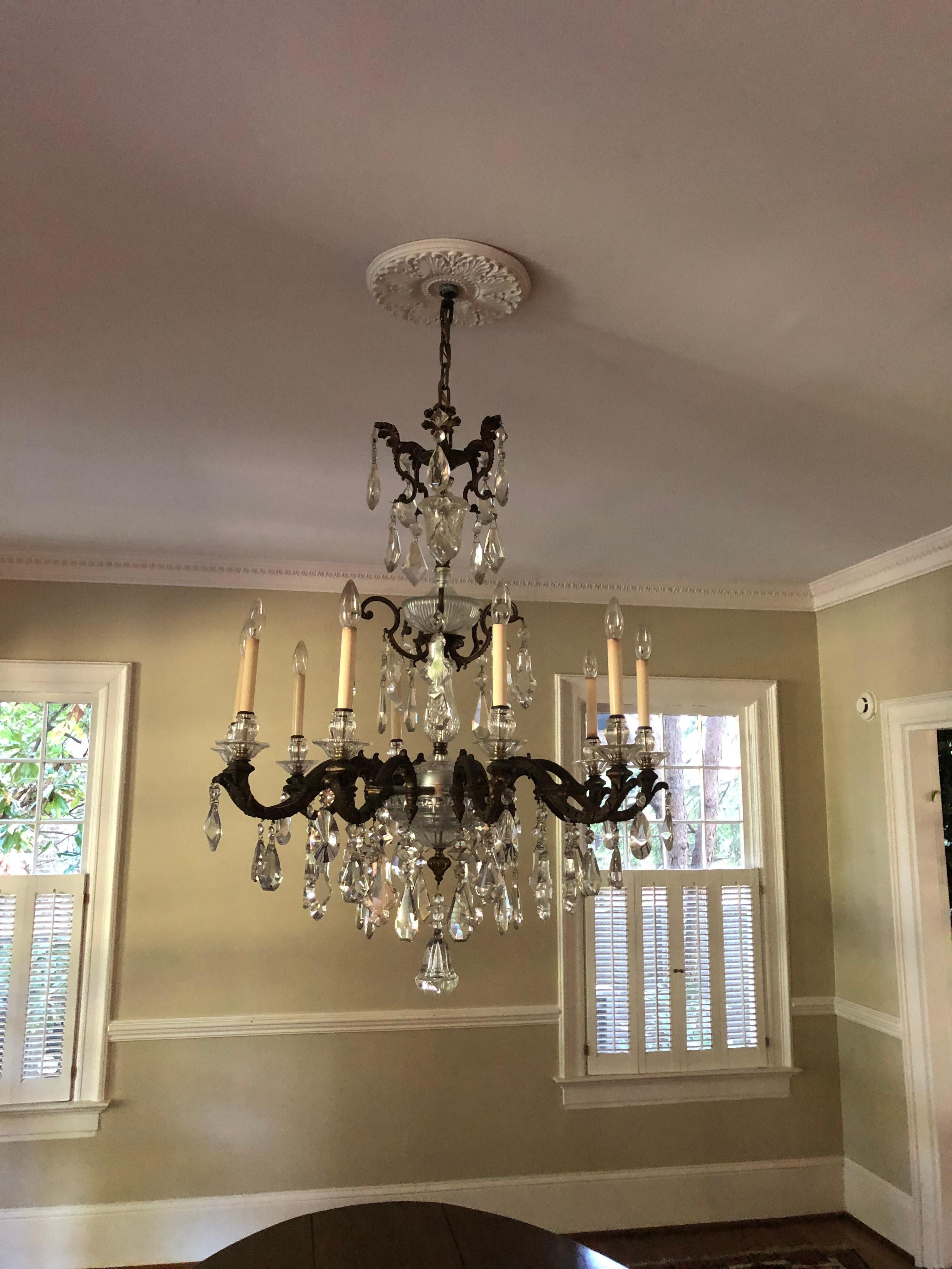 Very Fine Bronze & Crystal Chandelier Featuring Hand Cut Crystal Pendalogues In Good Condition For Sale In Atlanta, GA