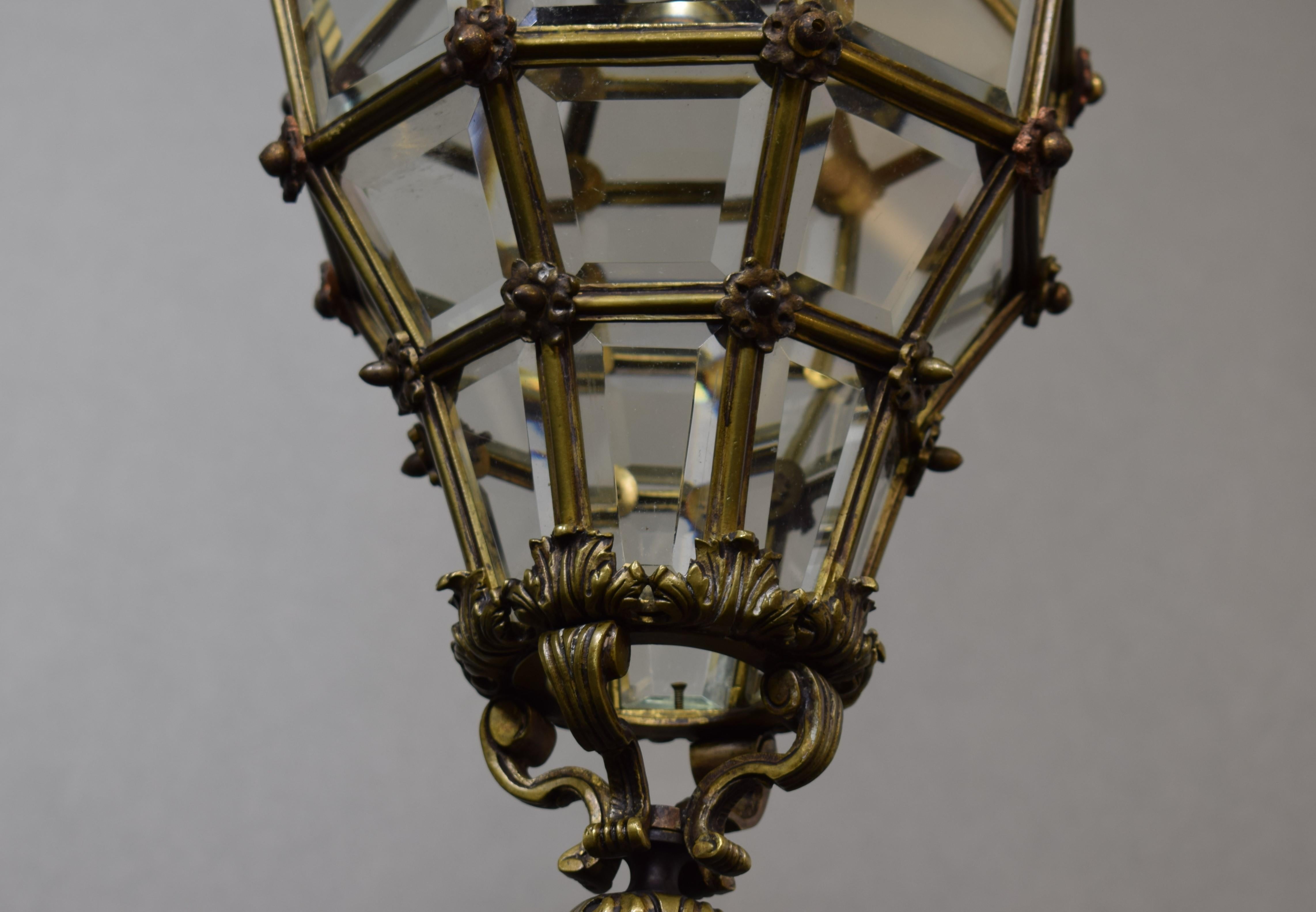 A very fine bronze Versailles style lantern. Beveled glass panels. 
France, circa 1910. 1 light
Dimensions: Height 23