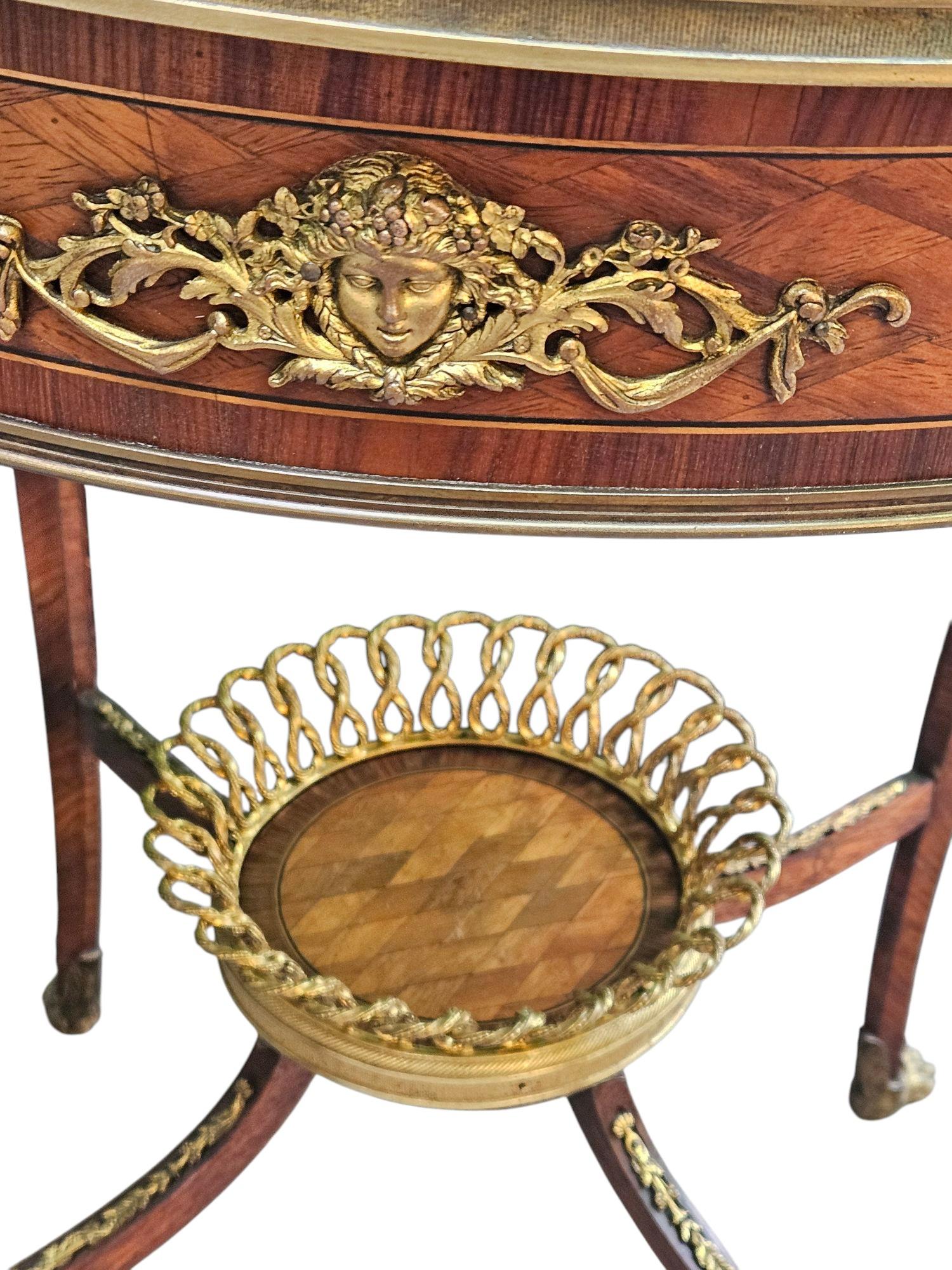 Beautiful Marble Topped Centre Table in the Louis XV style
Lovely Neoclassical Design 
Mahogany and Walnut with Lovely Ormolu Mounts
