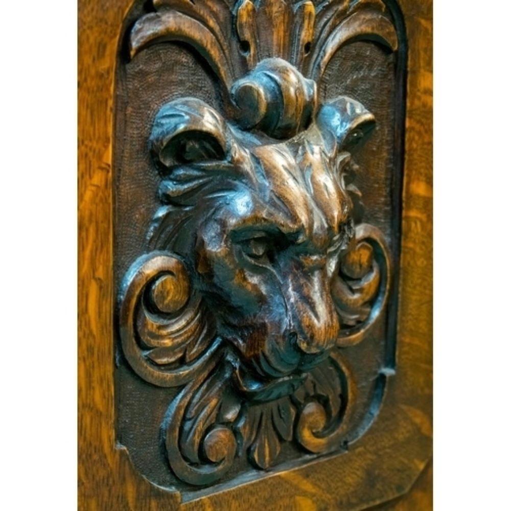 A very Fine Oak Library Bookcase
Lovely Carved Lion Heads on Doors
This bookcase is in Excellent Shape and Dates C1880s