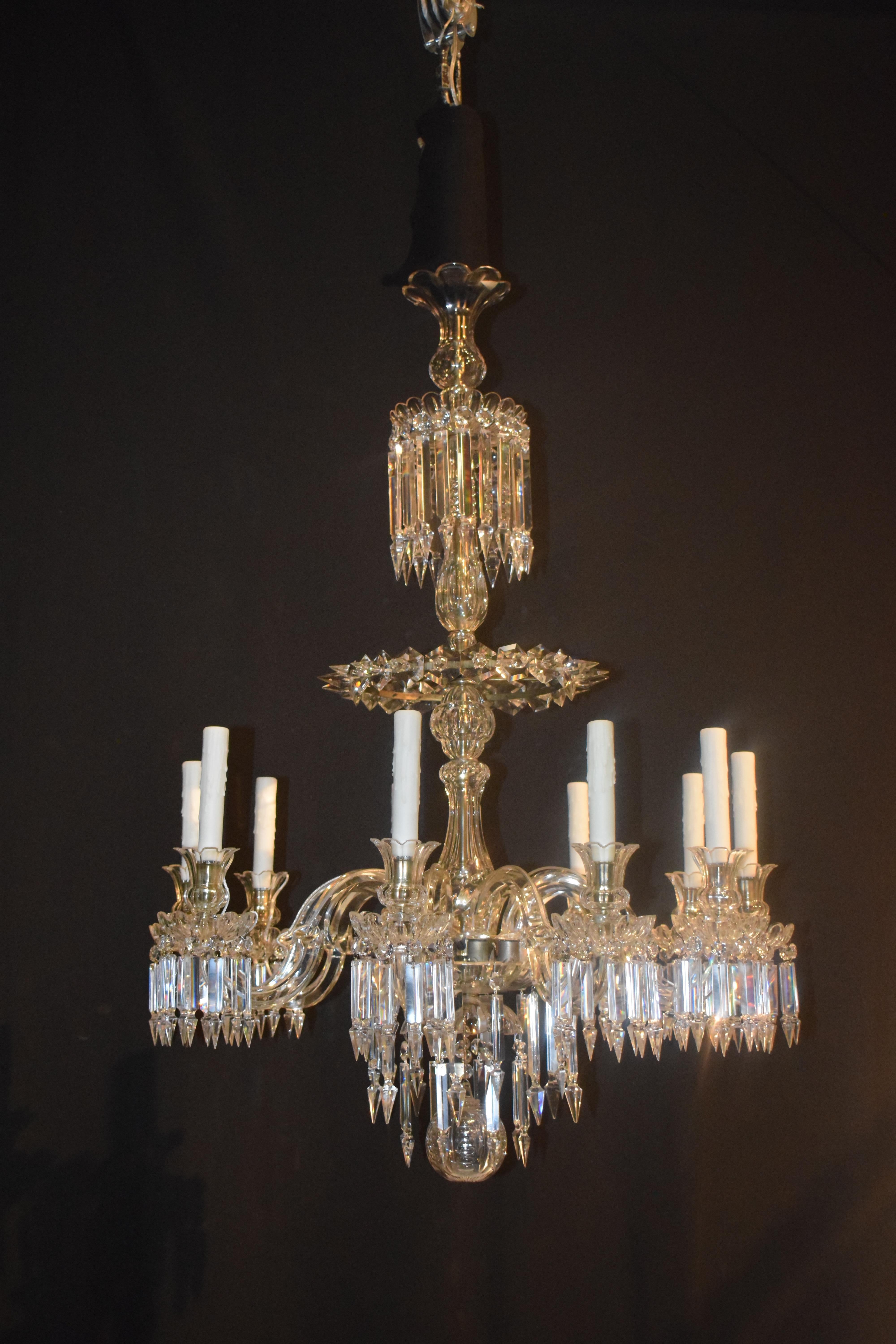 An Magnificent English Crystal Chandelier, originally for candles (now electrified). Exceptional Quality. 10 lights. France, circa 1860. 
Dimensions: Height 48