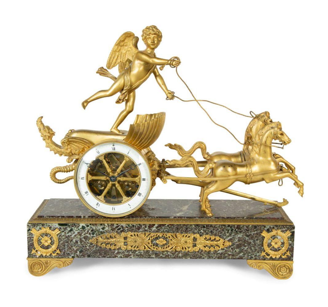 Très belle pendule de cheminée en bronze doré et marbre (Rosso Levanto) de style Directoire. XIXème siècle.
mouvement estampillé 1075.
Dimensions : hauteur 16 1/2