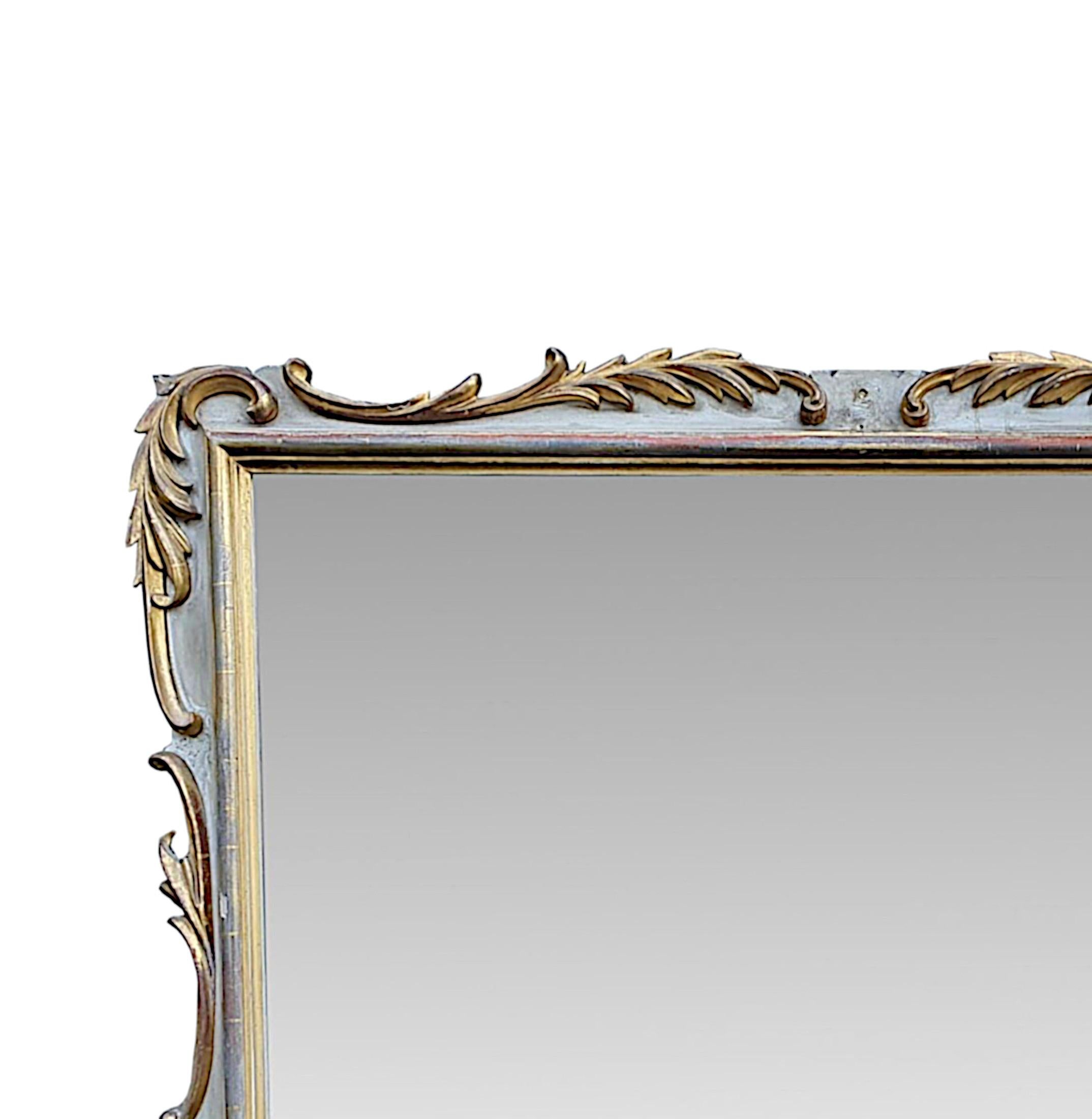 A very fine early 19th century Regency parcel gilt overmantle mirror of rectangular form in original condition. The slightly distressed, mercury mirror glass plate is set within a beautifully hand carved, moulded frame with gorgeous trailing
