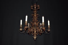 Lustre en fer de style baroque très fin et élégant