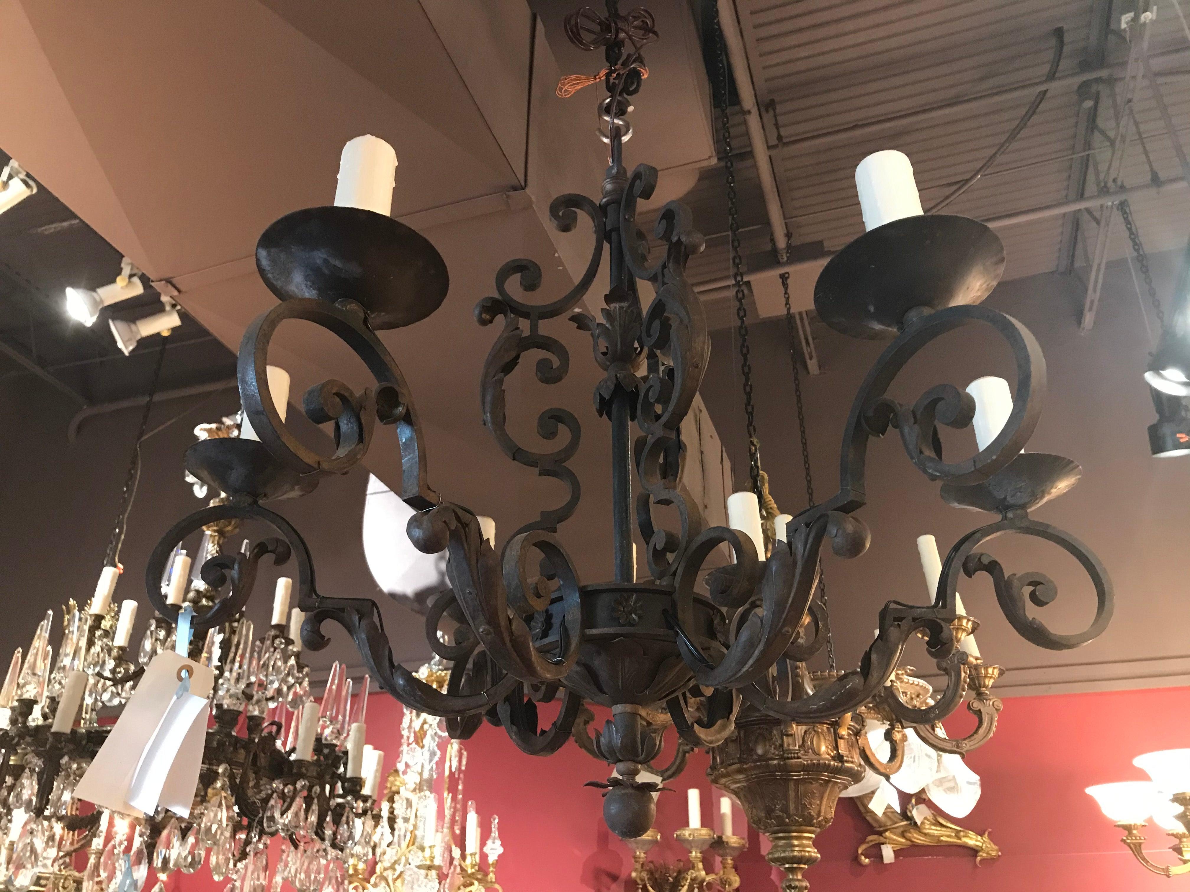 A very fine and elegant iron chandelier. Great workmanship. 6 lights.
Dimensions: Height 28 1/2