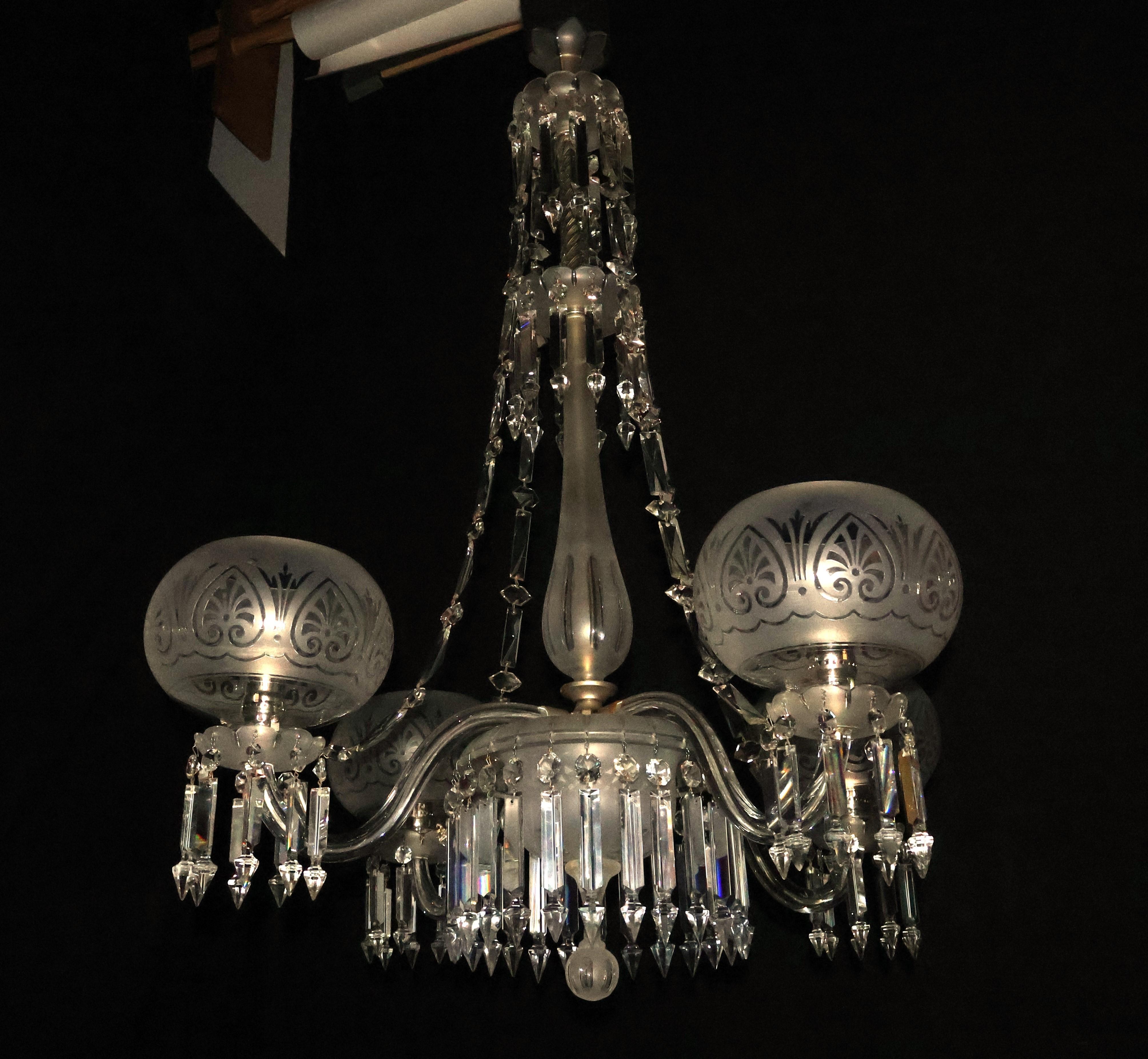 An Exquisite Gasolier Chandelier, now electrified. Four original etched crystal shades. England circa 1800. 
Dimensions: Height 41