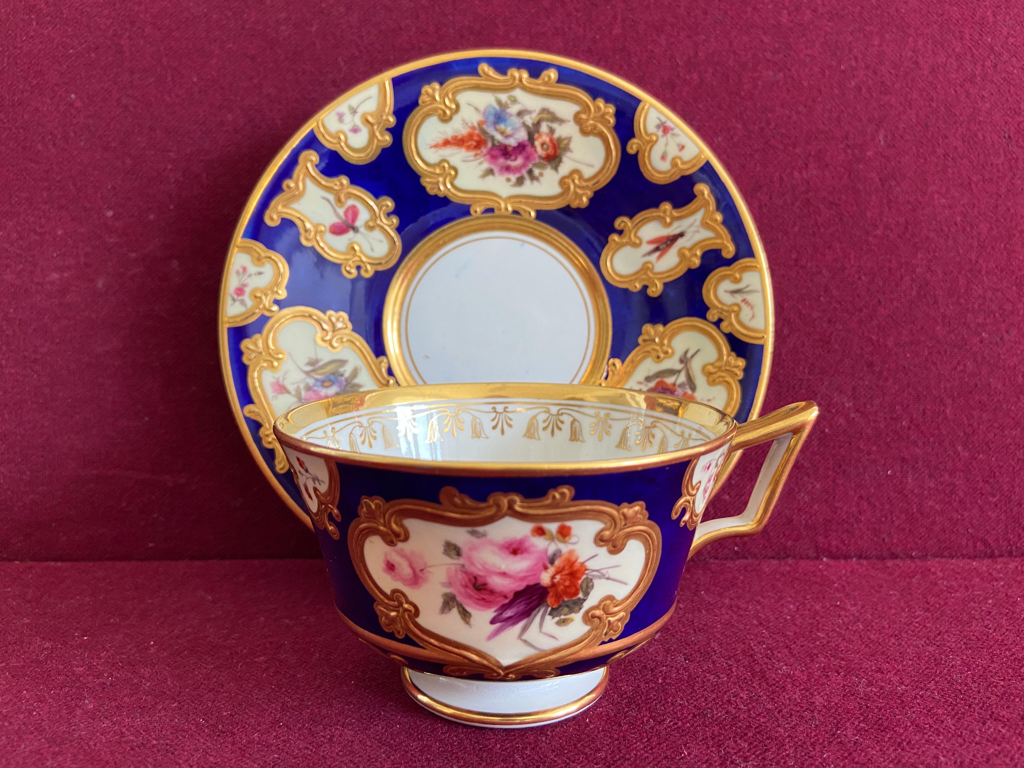 A very fine Flight Barr and Barr Worcester Porcelain tea cup and saucer c.1815. Finely decorated with panels of flowers by Samuel Astles in raised gilded compartments on a cobalt blue ground.

Impressed and printed marks.

Condition: Excellent.
