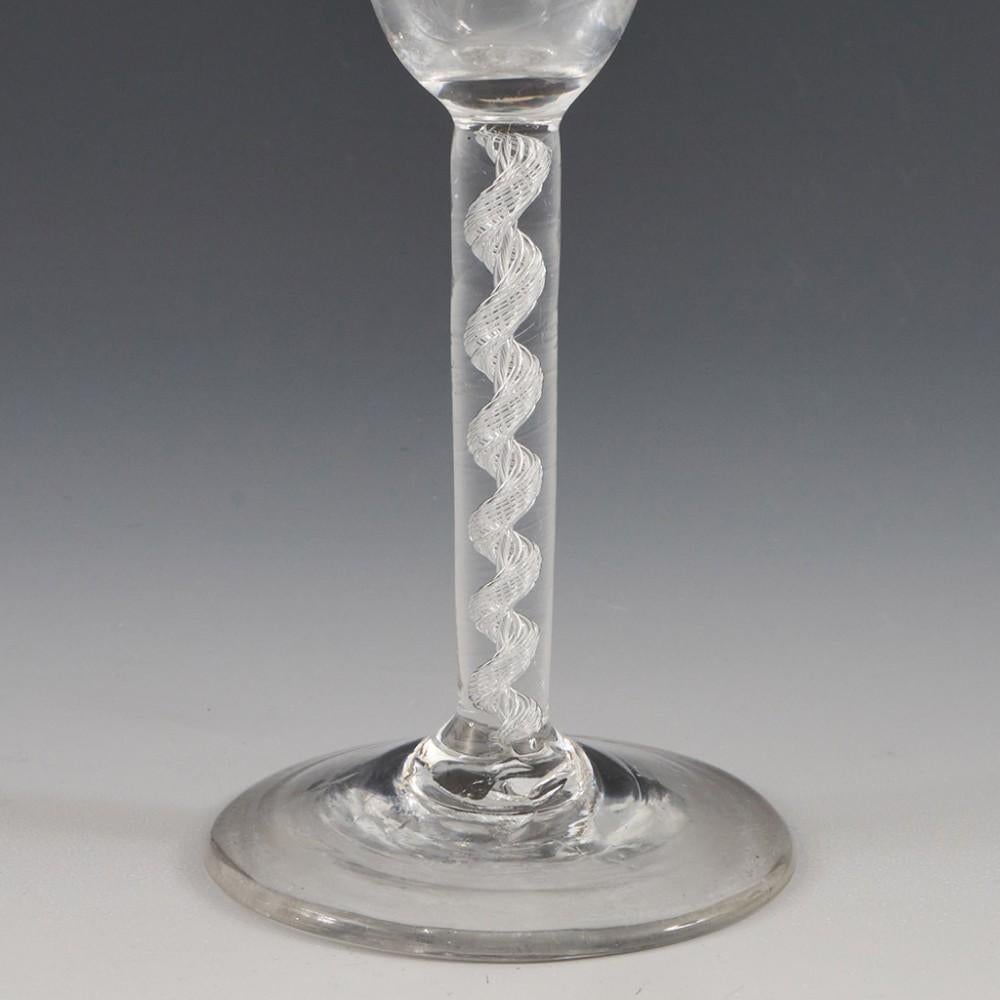 A Very Fine Georgian Air Twist Cable Wine Glass, circa 1750

Additional information:
Heading : A Very Fine Georgian Air Twist Cable Wine Glass
Period : George II
Origin : England
Colour : Clear, good grey hue
Bowl : Round funnnel, excellent
