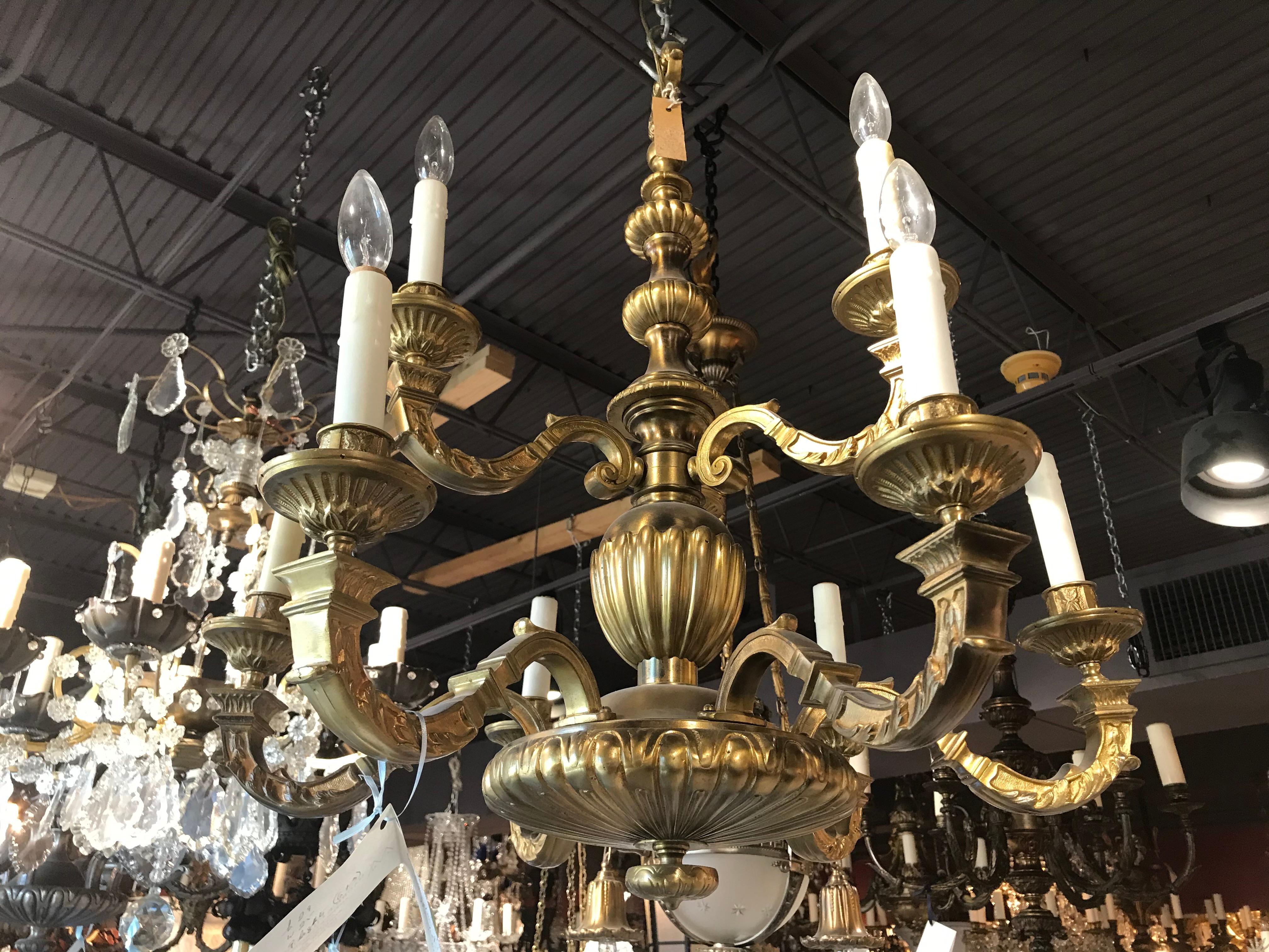 A very fine gilt bronze chandelier. 9-light (6 on bottom + 3 on top)
France, circa 1900
Dimensions: Height 29