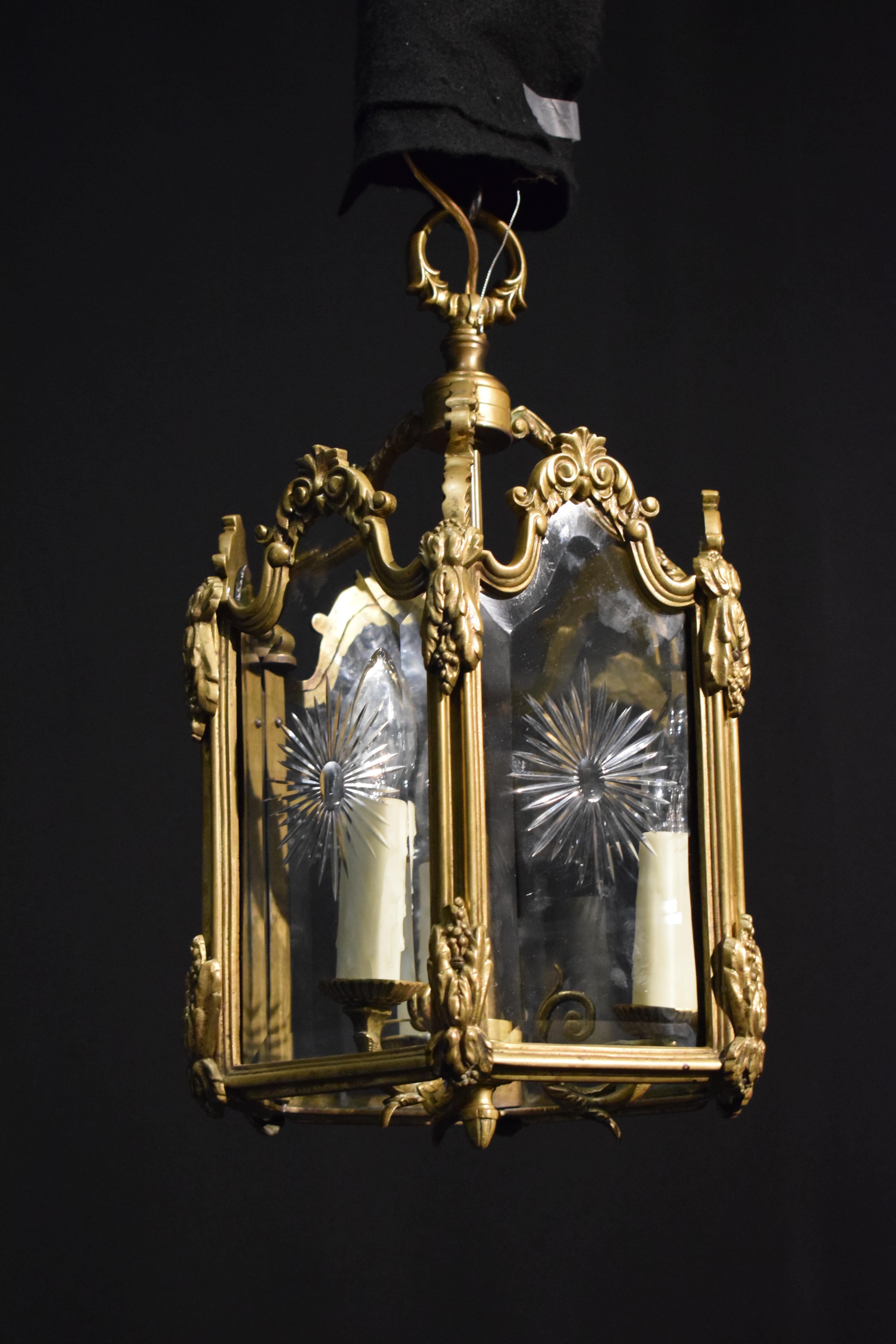 A very fine gilt bronze Hexagonal form Lantern with cut glass panels. 
Louis XVI style. France, circa 1920. 
Dimensions: Height 20