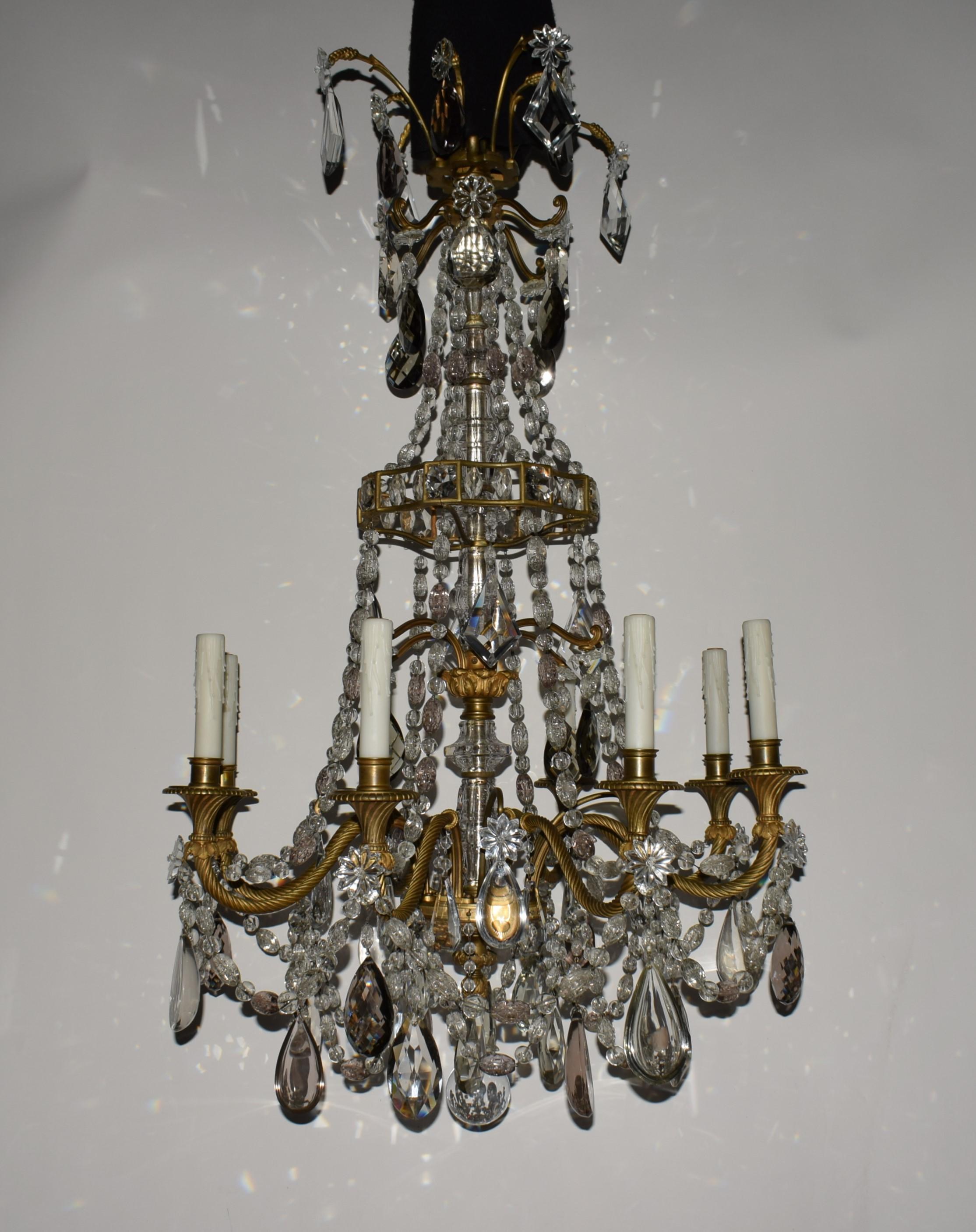 A very fine Napoleon III style chandelier with rope twist arm having a bronze dore frame ornate with clear, 