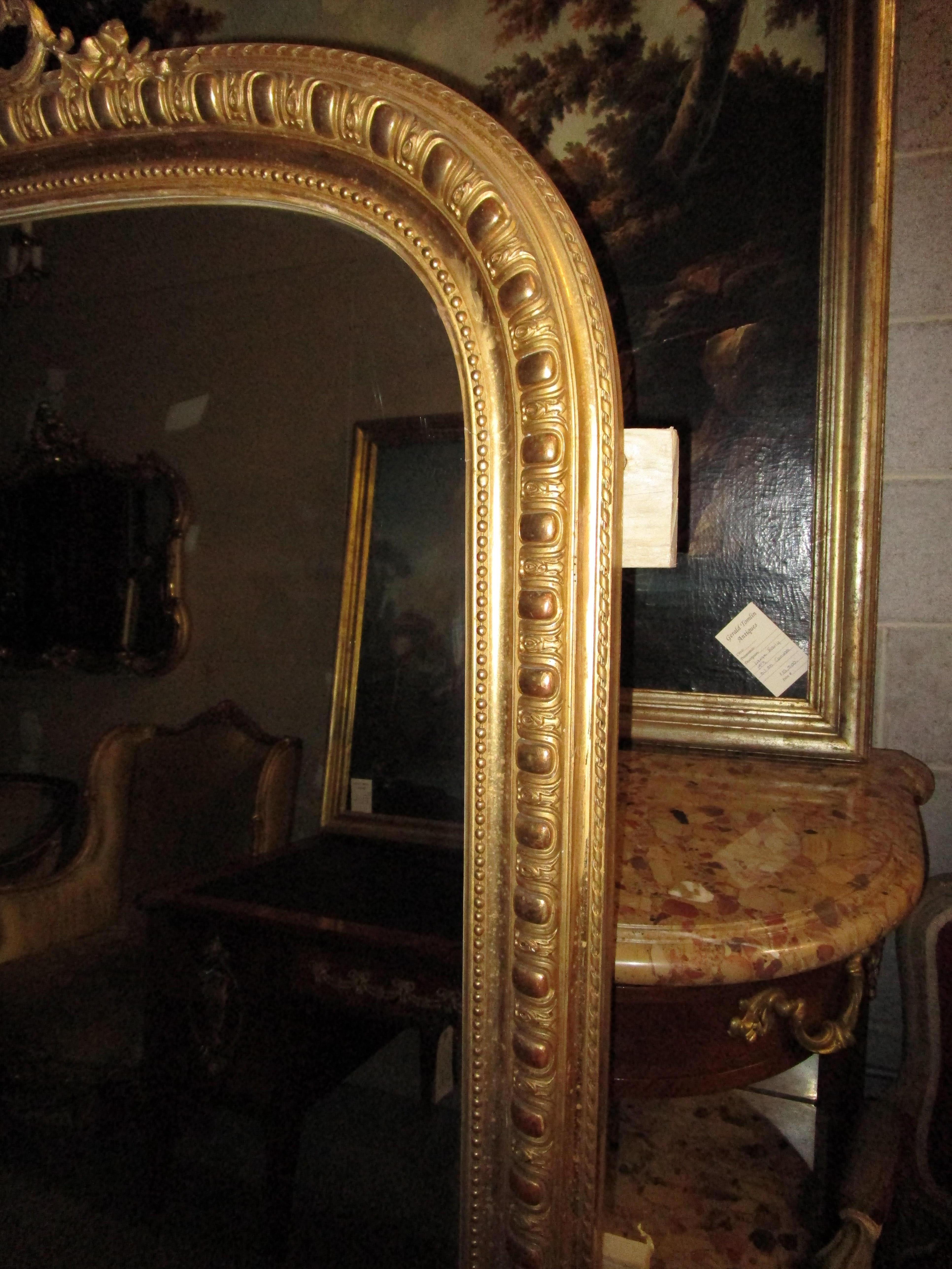 Hand-Carved Very Fine Large 19th Century French Louis XVI Gilt Carved Mirror For Sale