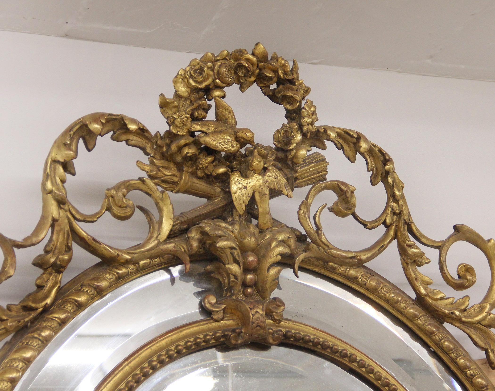 Ein sehr schöner Spiegel aus geschnitztem Giltwood und Gesso aus dem späten 19.

Ovale Form mit Tauben 