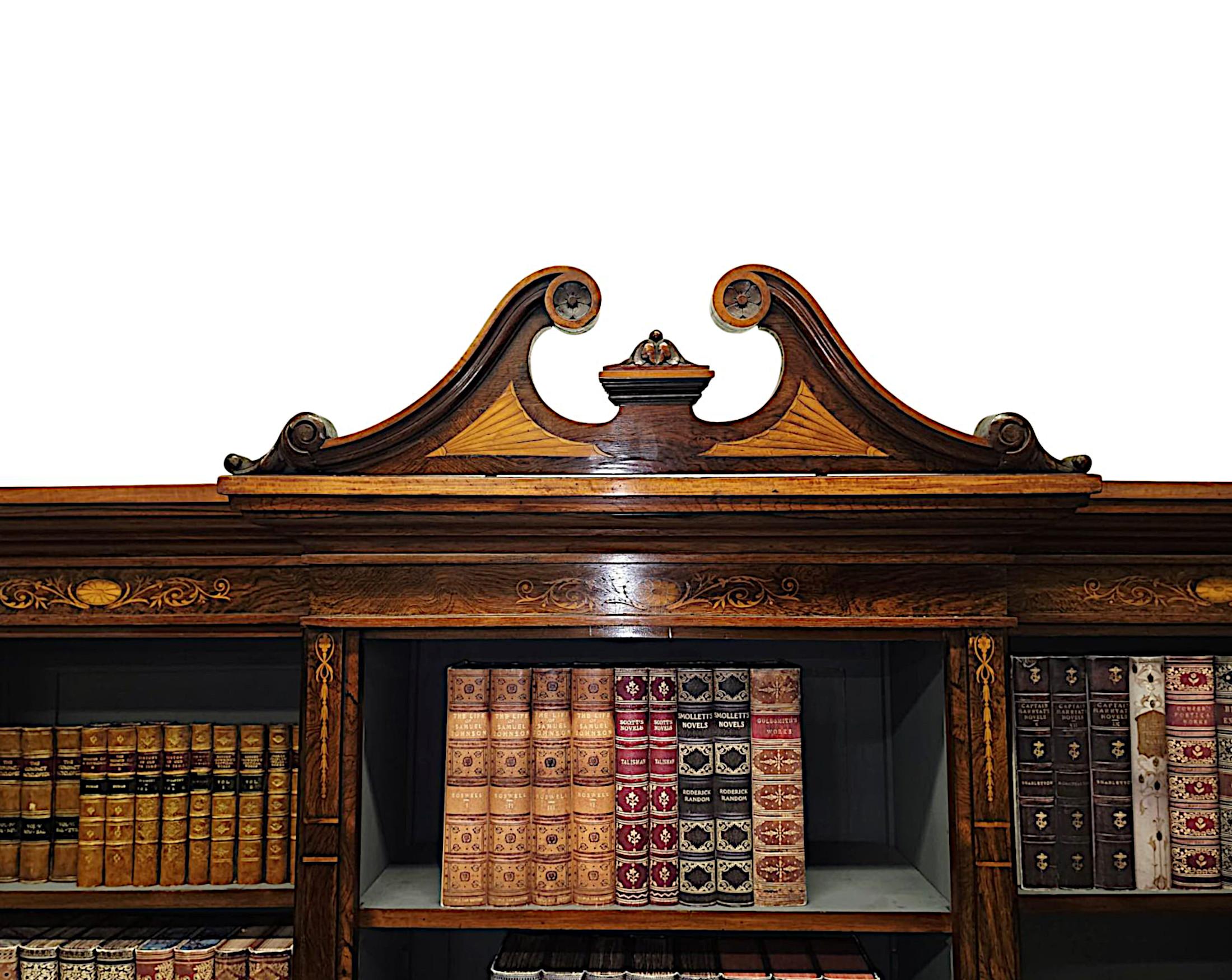 Inglese Una raffinata libreria a giorno intarsiata della fine del XIX secolo in vendita