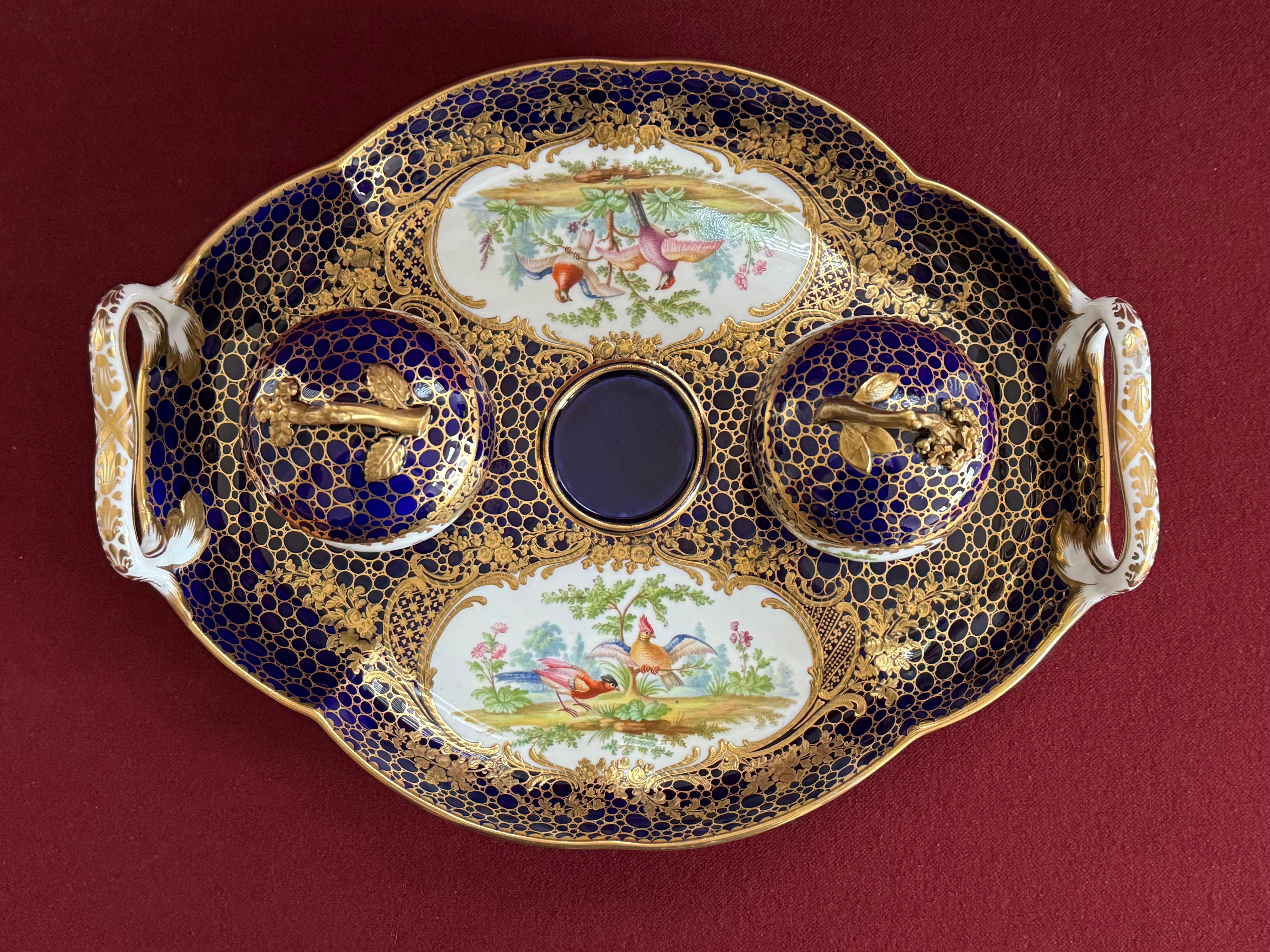 A beautiful Minton porcelain Inkstand c.1840. The form of this Inkstand is the same basic shape as Minton’s ‘New Tray’ design number 245 as illustrated by Geoffrey Godden in plate 107 of his book on Minton Porcelains. This piece is exquisitely