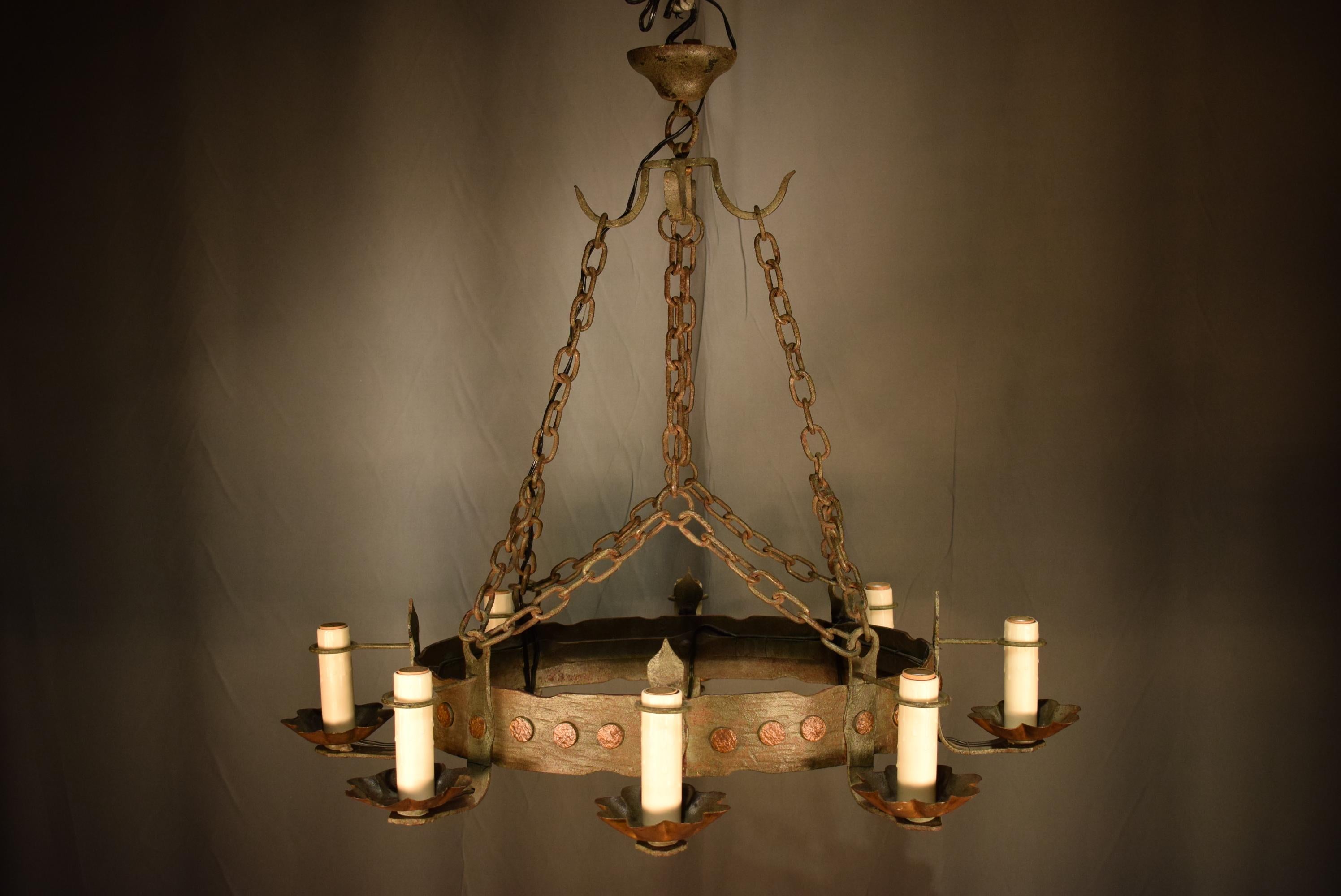A very Fine oval iron chandelier in the Tudor style. France, circa 1910
8 Lights. A pair available
Dimensions: Height 32