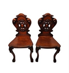 A Very Fine Pair of 19th Century Hall Chairs With Paw Foot