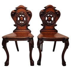 A Very Fine Pair of 19th Century Hall Chairs With Paw Foot
