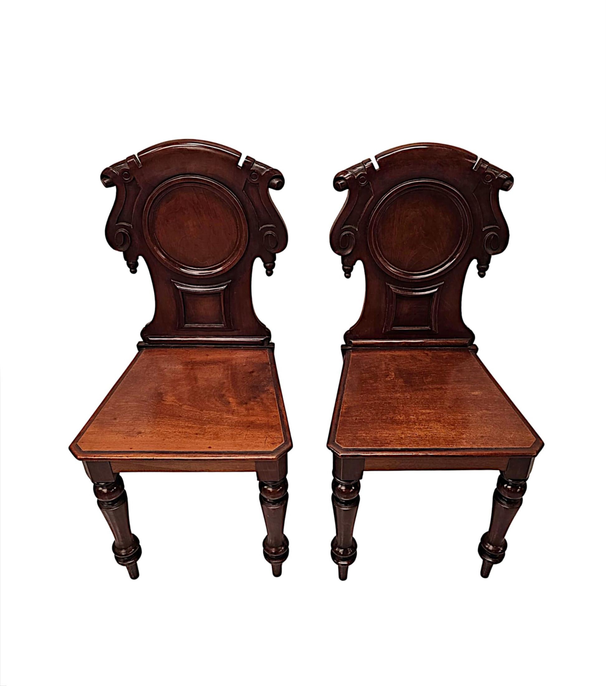 English A Very Fine Pair of 19th Century Mahogany Hall Chairs For Sale