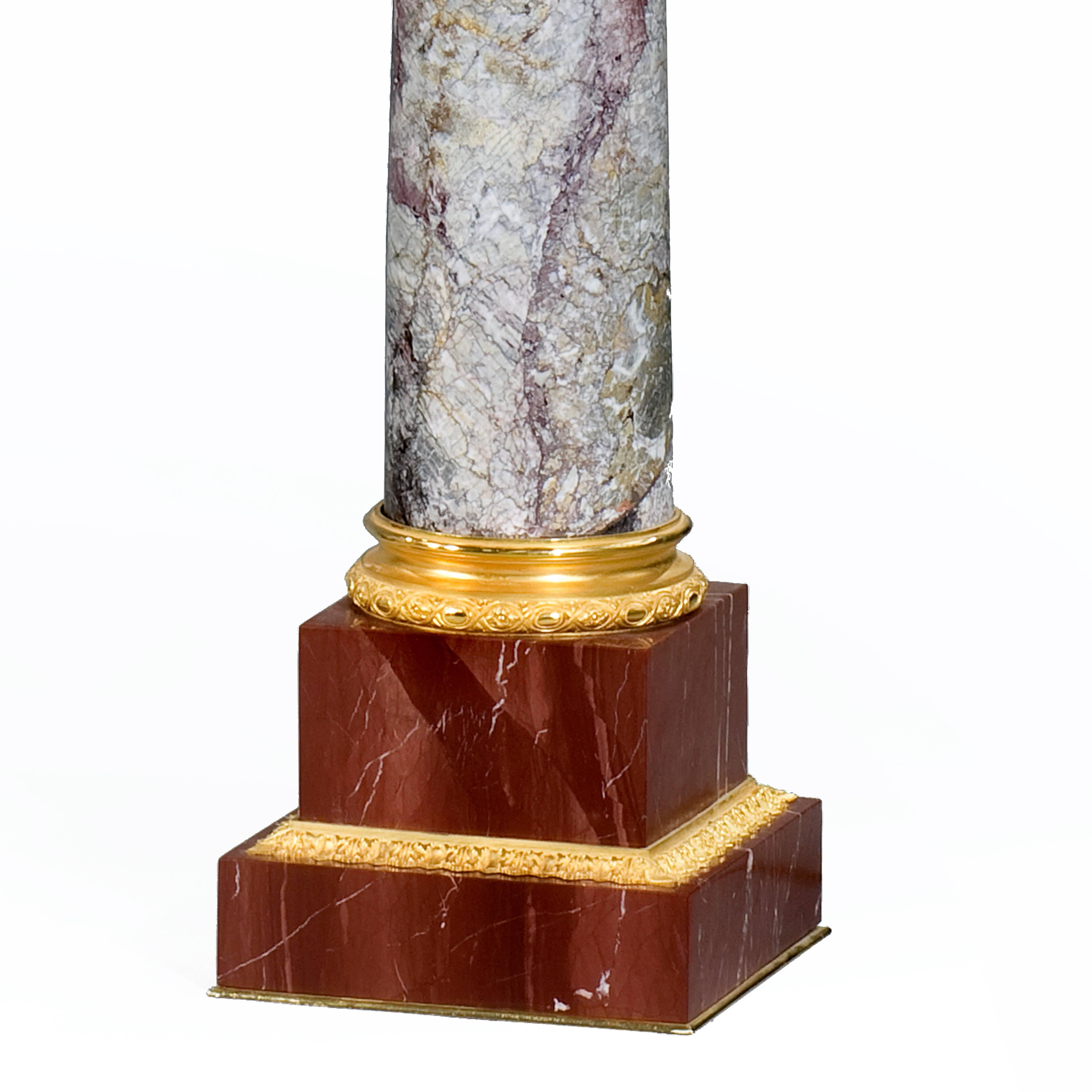 This imposing pair of Villefranche de Conflent marble pedestals have Corinthian capitals and classical borders in ormolu of the finest quality and have great presence.
 