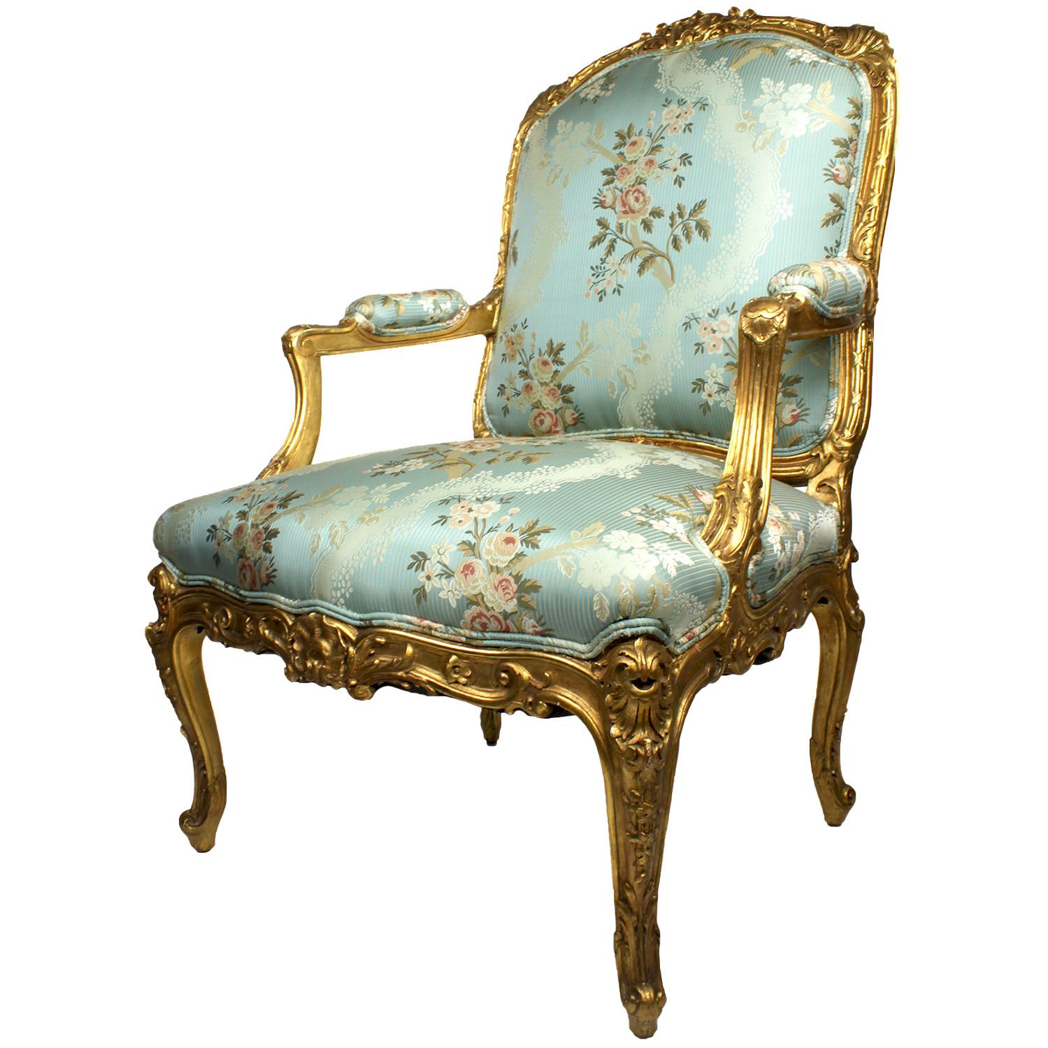 A Very Fine Pair of French 19th Century Louis XV style giltwood Carved 'Fauteuils a la Reine' Armchairs. The superbly carved frames, with padded backs, armrests and seats, all upholstered in a recent silk and cotton fabric, topped with floral