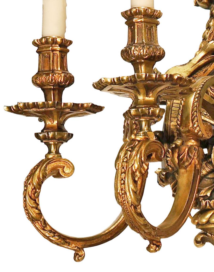 A Very Fine Pair of Gilt Bronze Wall Sconces in the Regence taste. In Good Condition For Sale In Atlanta, GA