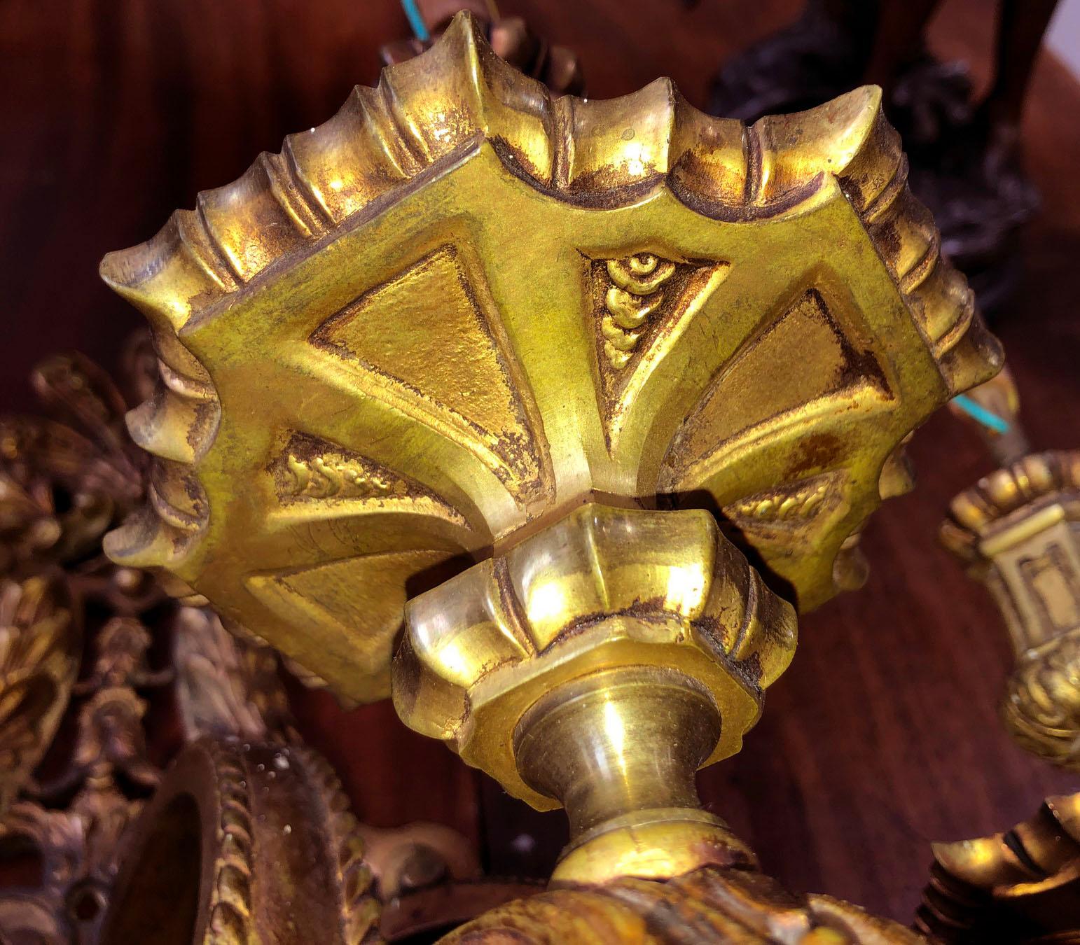 Early 20th Century A Very Fine Pair of Gilt Bronze Wall Sconces in the Regence taste. For Sale