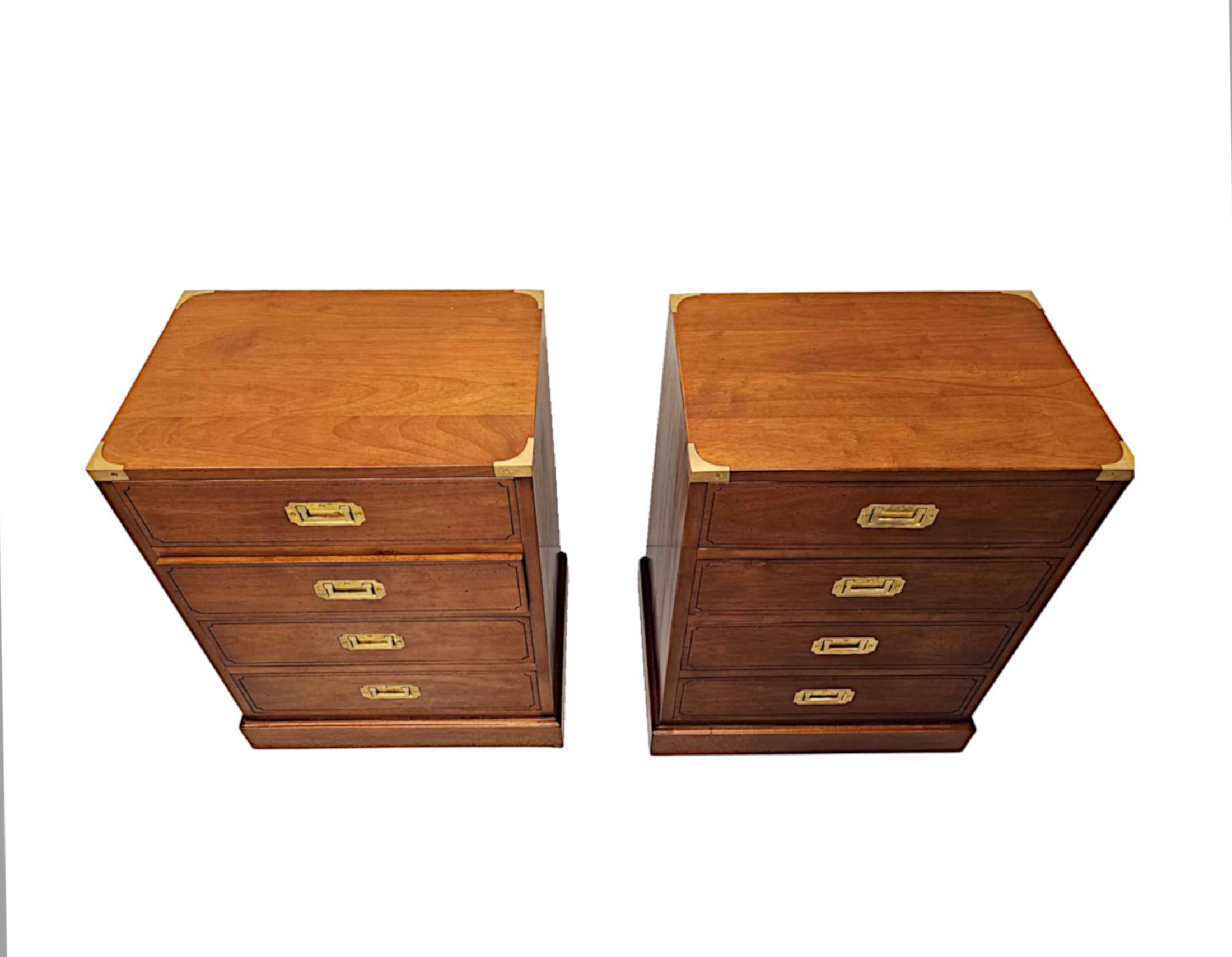 A very fine pair of bedside chests in the campaign style, of exceptional quality and fabulously hand made with gorgeously rich patination and grain.  The well figured moulded top of rectangular form framed with decorative brass corner mounts is