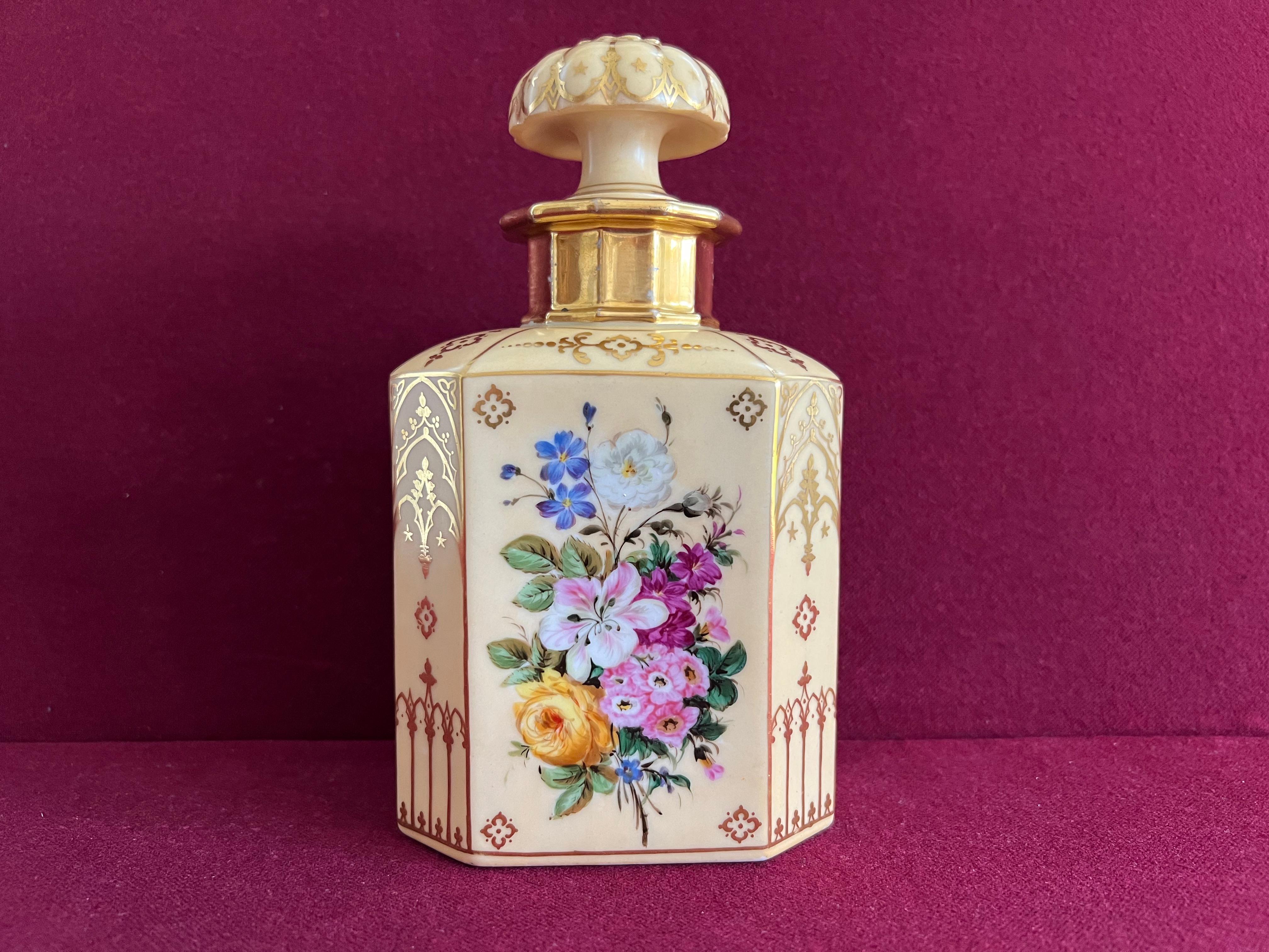 A very fine Paris Porcelain scent bottle c.1840 of rectangular form, very finely decorated with a pale orange ground, bouquets of summer flowers and Gothic style gilding.

Unmarked.

Condition: Small flea-bite chip to the inner rim and a couple