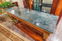 A very fine Regency period rosewood and parcel gilt marble top console table