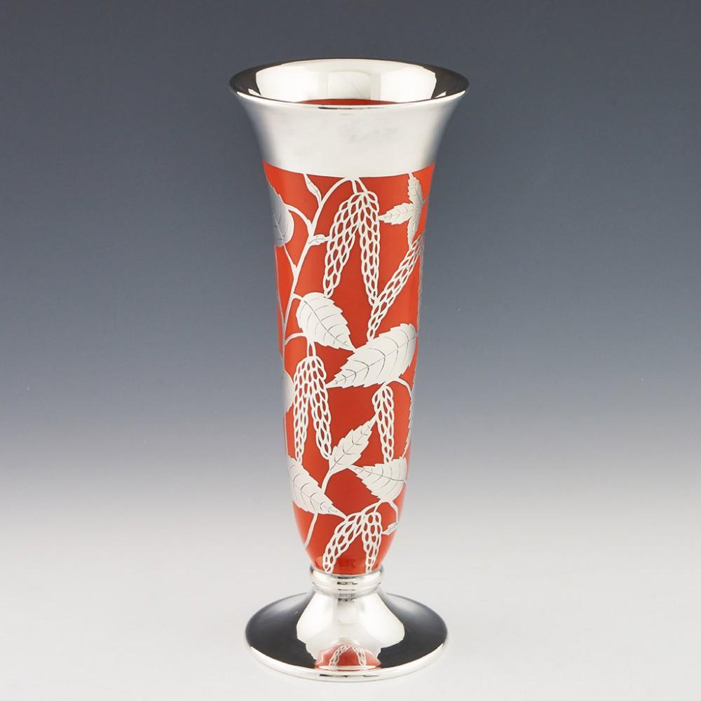 A Very Fine Signed Friedrich William Spahr Silver Overlay Vase, c1938

The porcelain base is almost certainly by Rosenthal

Additional information: 
Date : c1938
Origin : Schwabisch Gmund, Germany
Bowl Features : Engraved silver overlay birch leaves