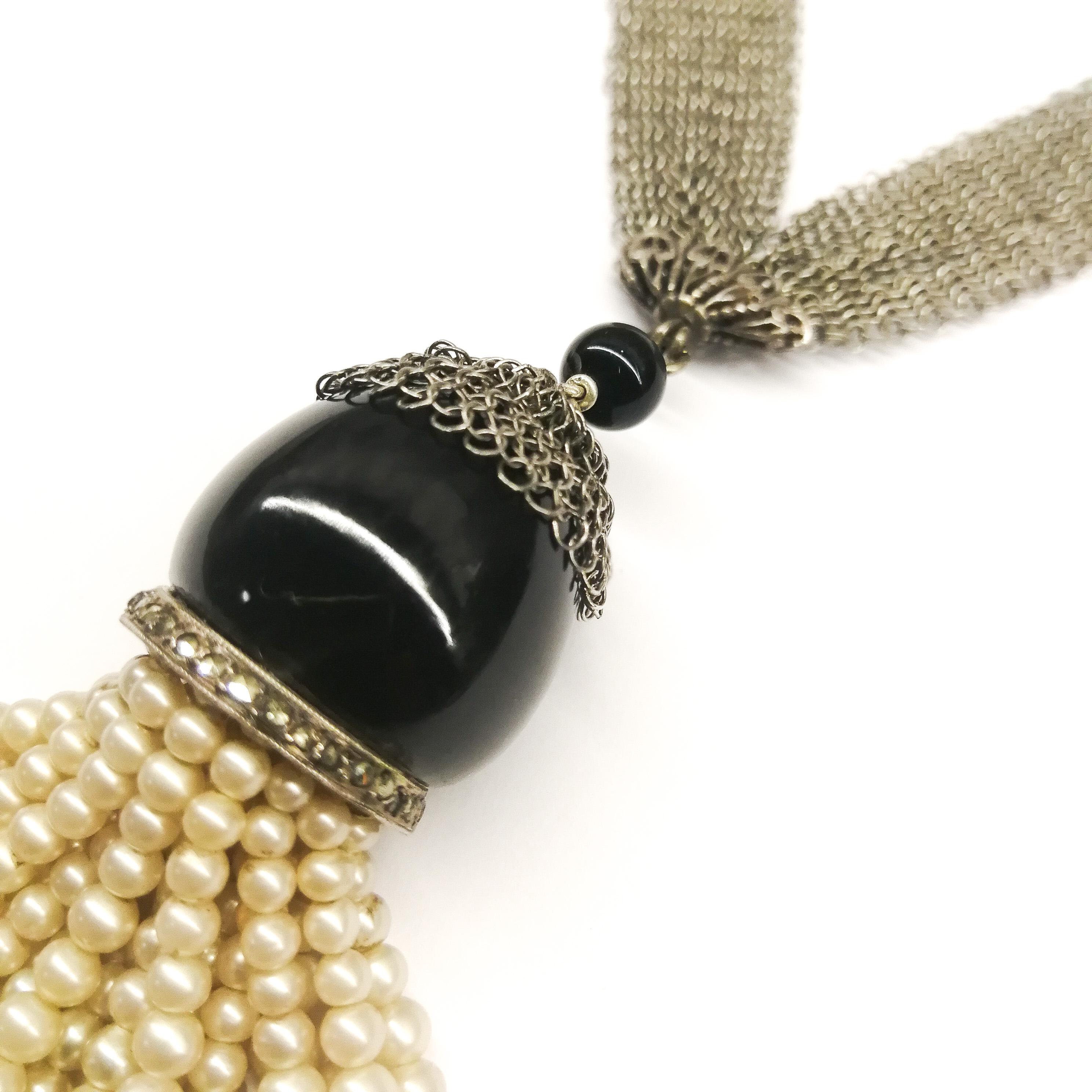 Art Deco A very fine silver mesh, onyx, marcasite and paste pearl 'tassel' sautoir, 1920s