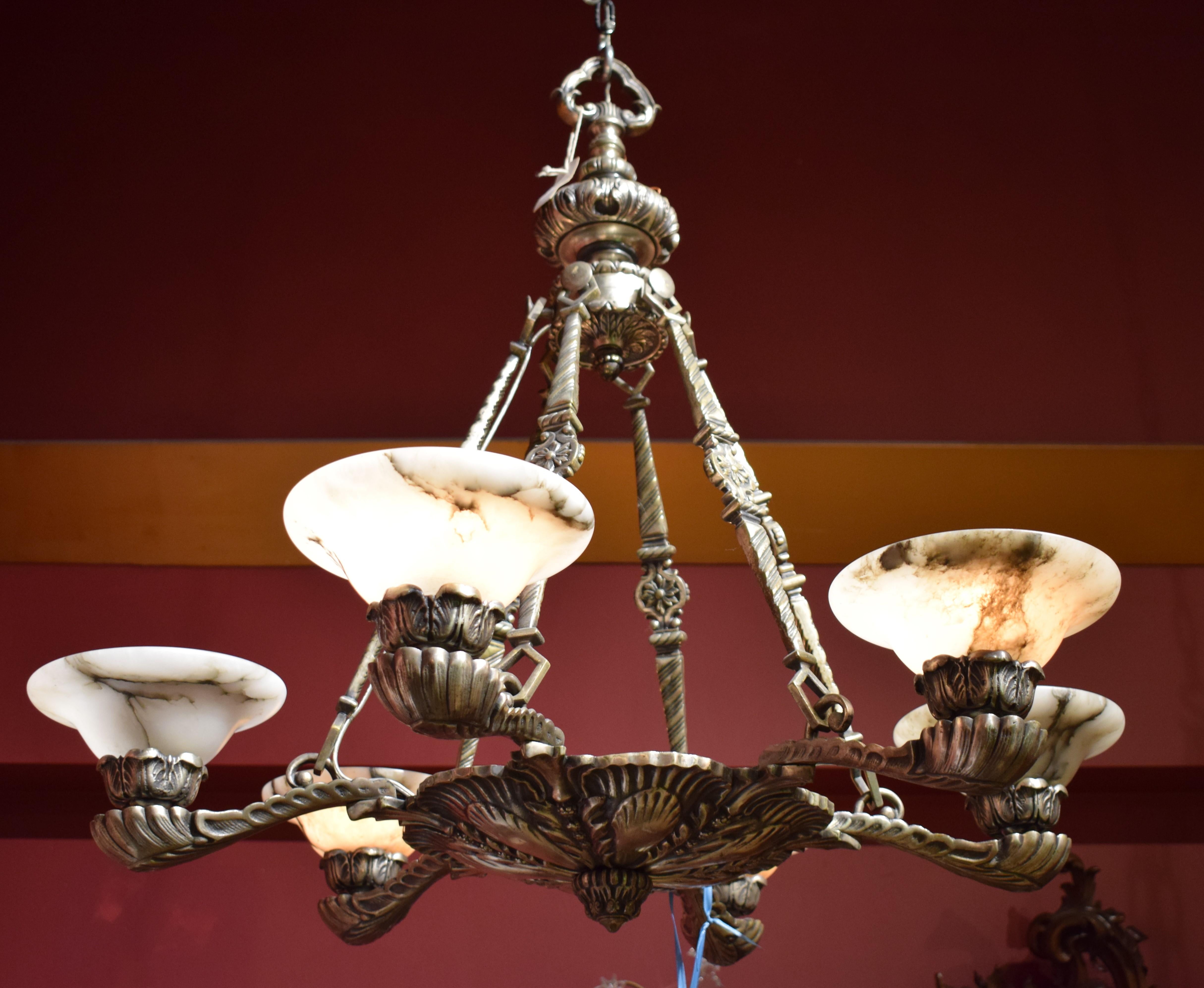 A very fine silver over bronze & alabaster chandelier. France, circa 1930. 6 lights
Dimensions: height 28