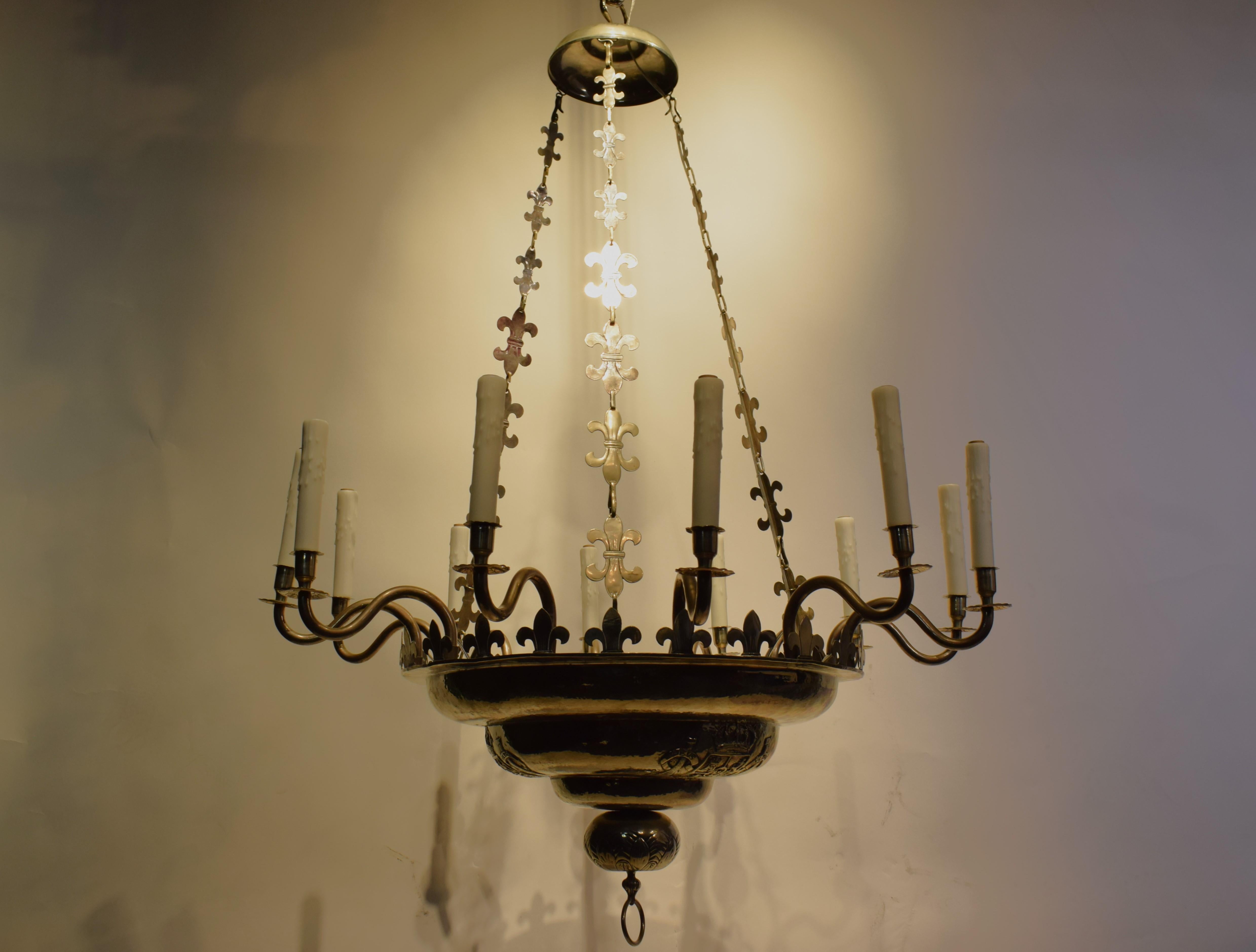 Exquisite & Elegant Example of Regency style Silver over Bronze Chandelier, originally for candles now electrified. France, circa 1860. 12 lights. 
Dimensions: Height 53 Diameter 40