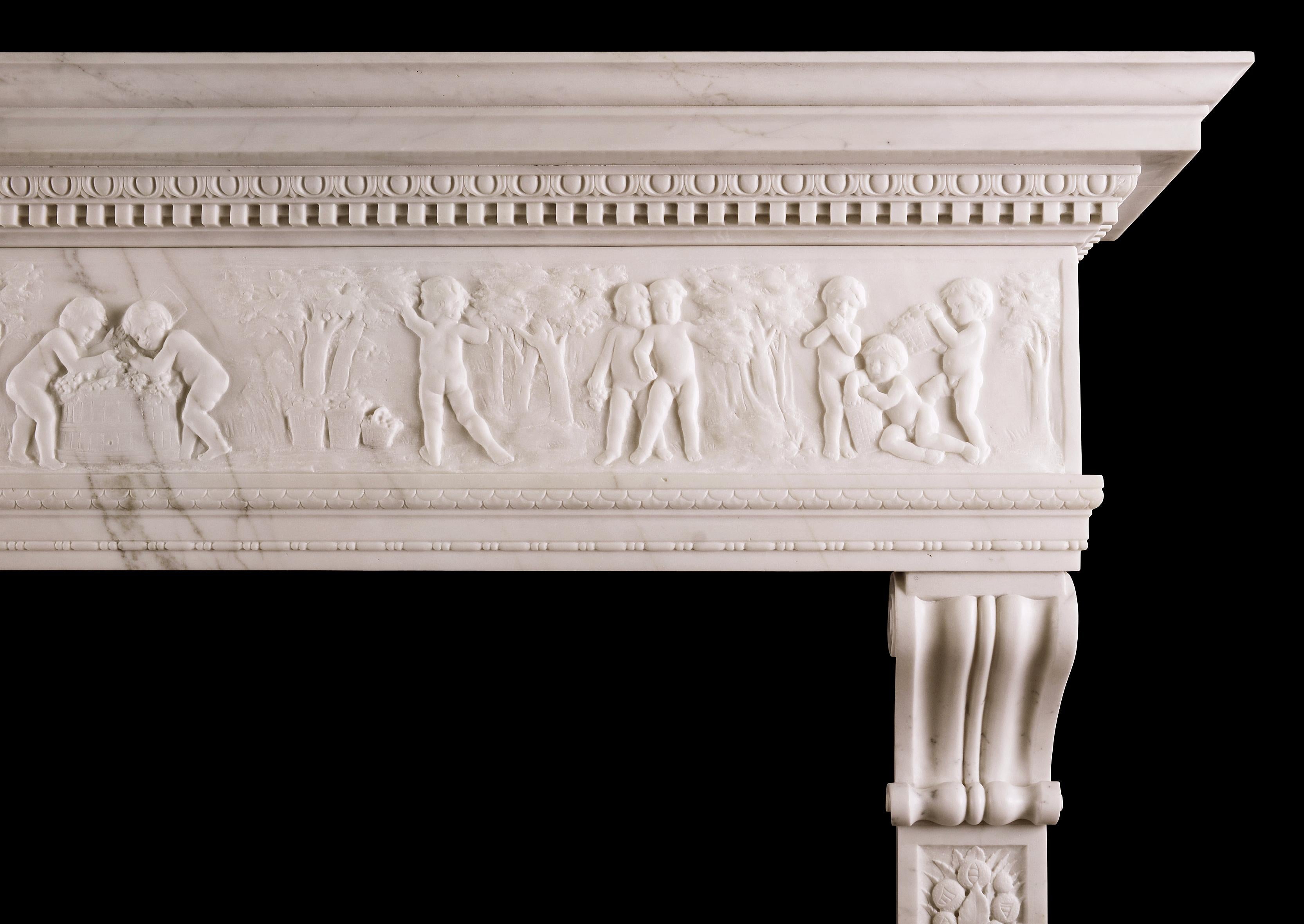 A very fine statuary white marble fireplace in the Italian Renaissance manner. The carved jambs featuring classical amphorae surmounted by fruit, acorns, ribbons and foliage topped with finely carved scrolled brackets. The carved frieze with putti