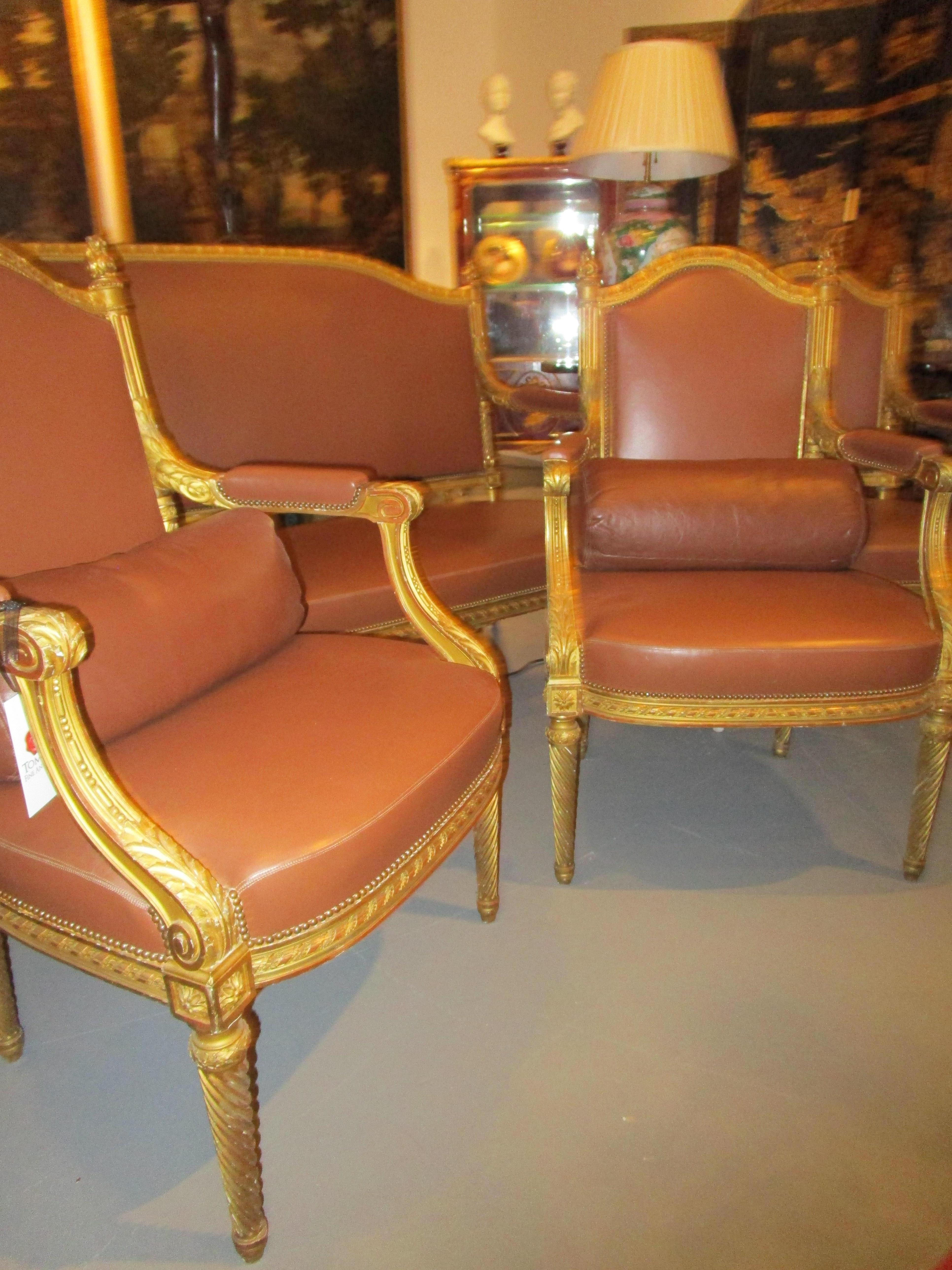 Very Fine Suite of 19th Century Louis XVI Giltwood Carved Armchairs and Settee For Sale 1