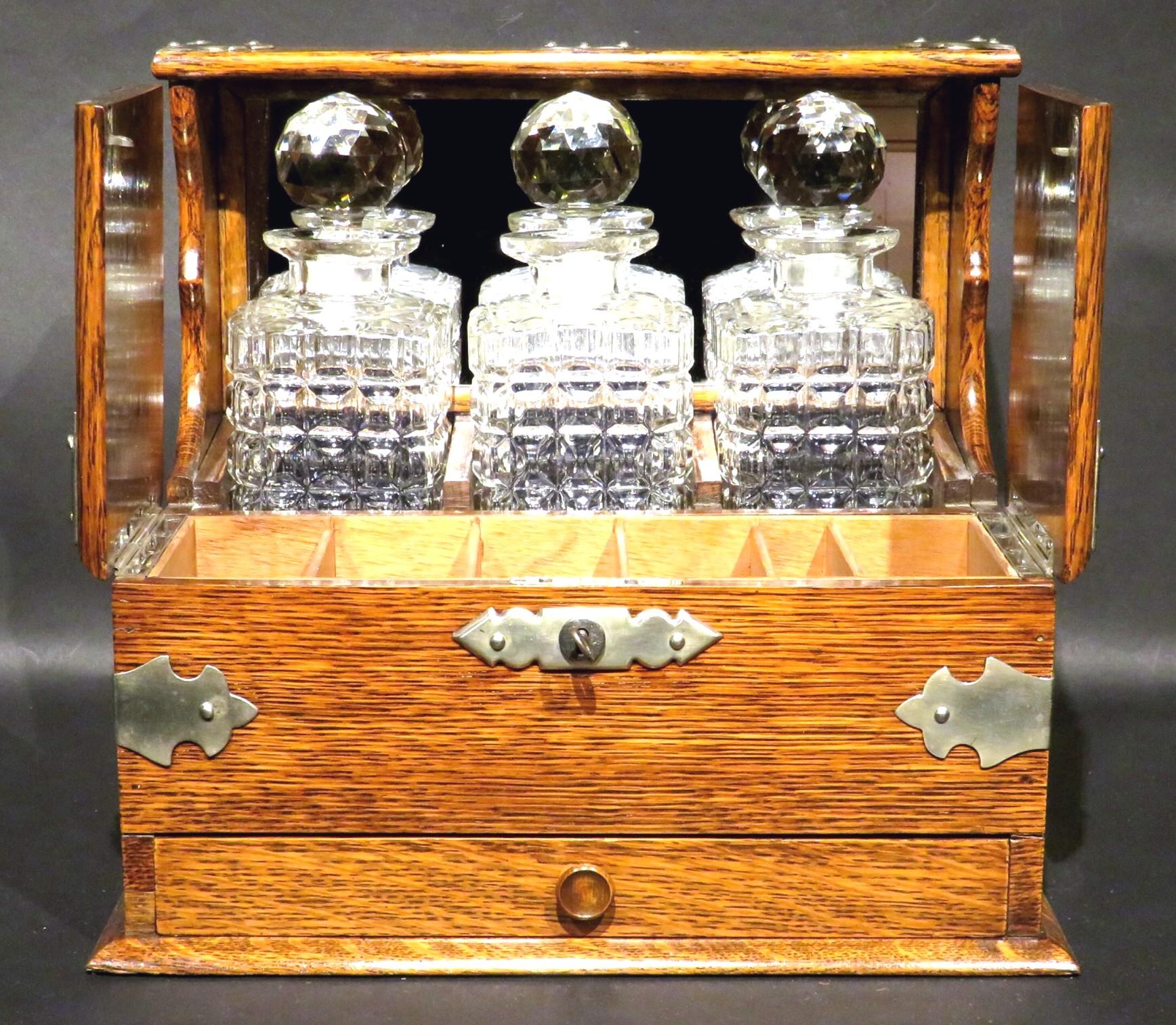 A Very Good Early 20th Century Oak & Silver Plated Tantalus, U.K. Circa 1910 For Sale 1