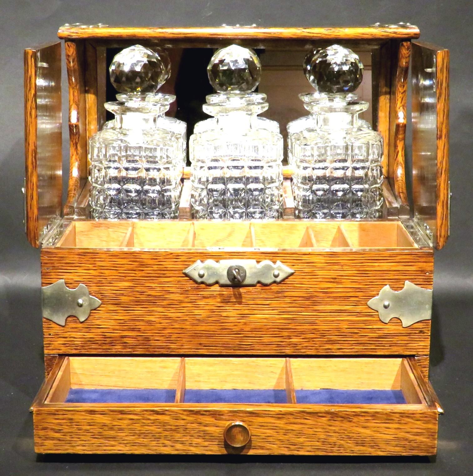 A Very Good Early 20th Century Oak & Silver Plated Tantalus, U.K. Circa 1910 For Sale 2