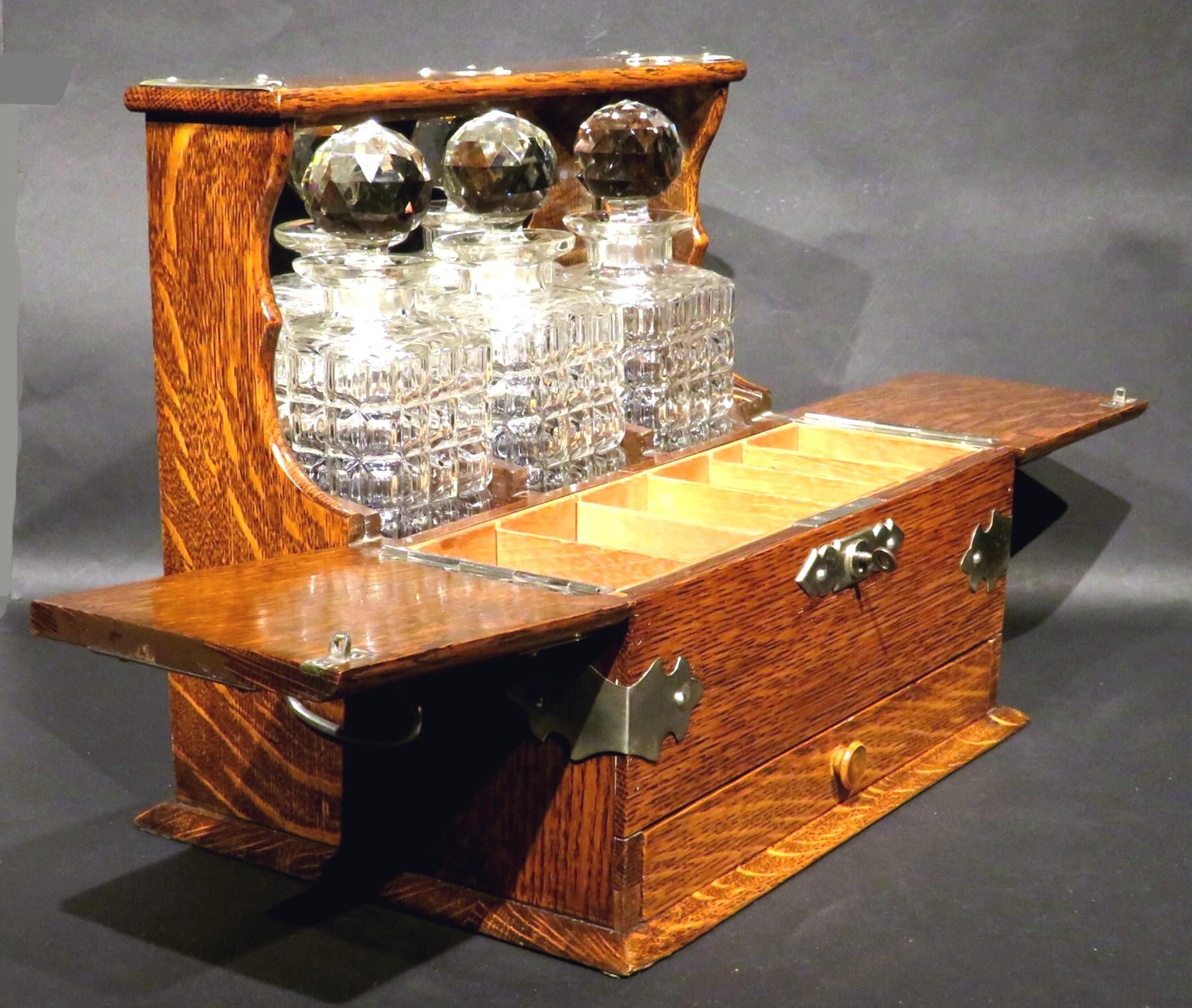 British A Very Good Early 20th Century Oak & Silver Plated Tantalus, U.K. Circa 1910 For Sale