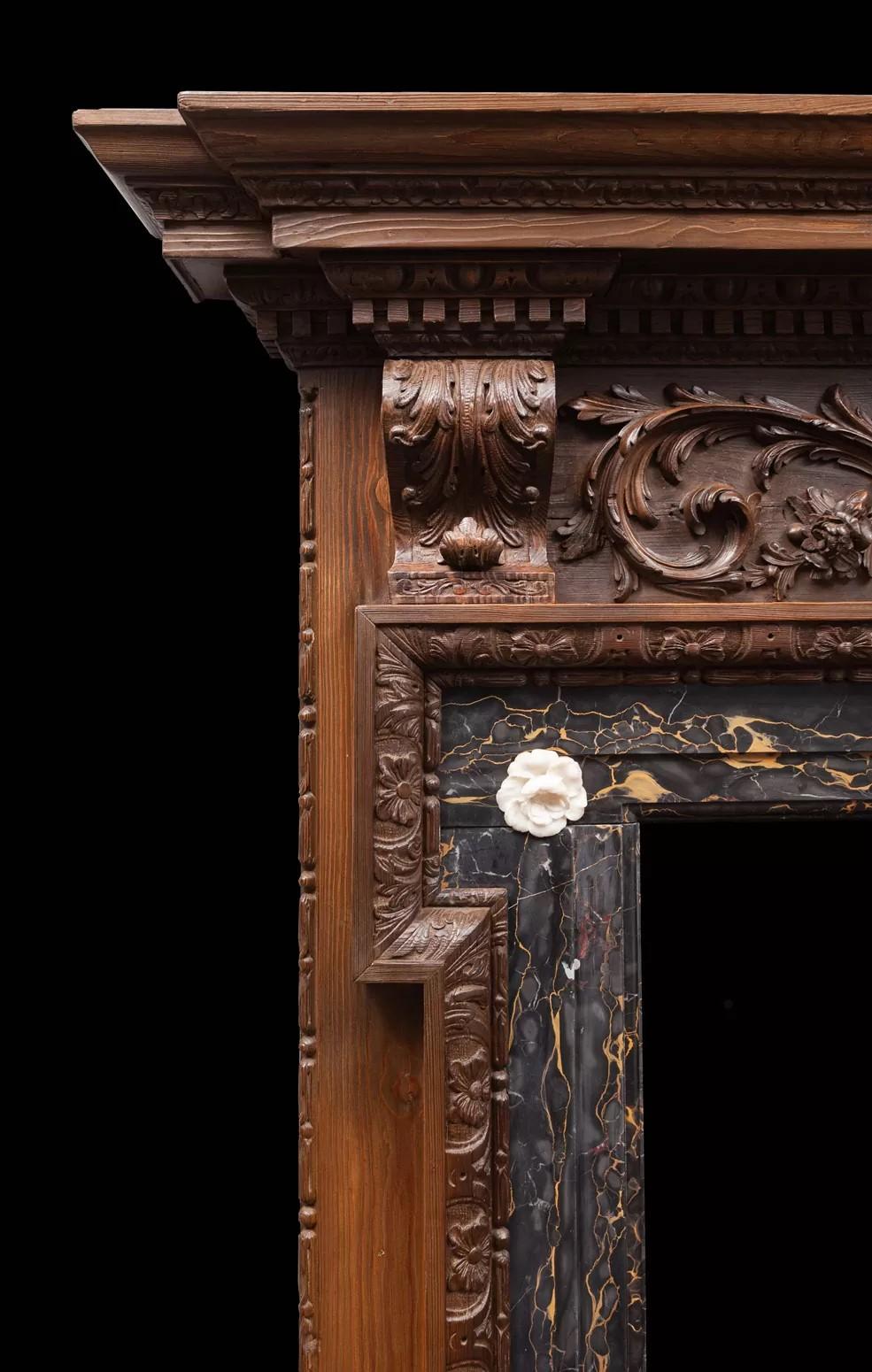 Palladian A very good George II carved pine mantel with Portoro marble interior For Sale