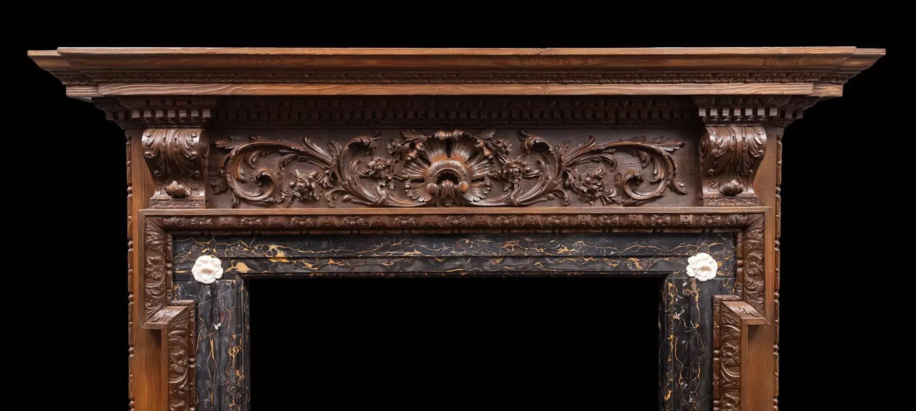 English A very good George II carved pine mantel with Portoro marble interior For Sale