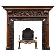 A very good George II carved pine mantel with Portoro marble interior