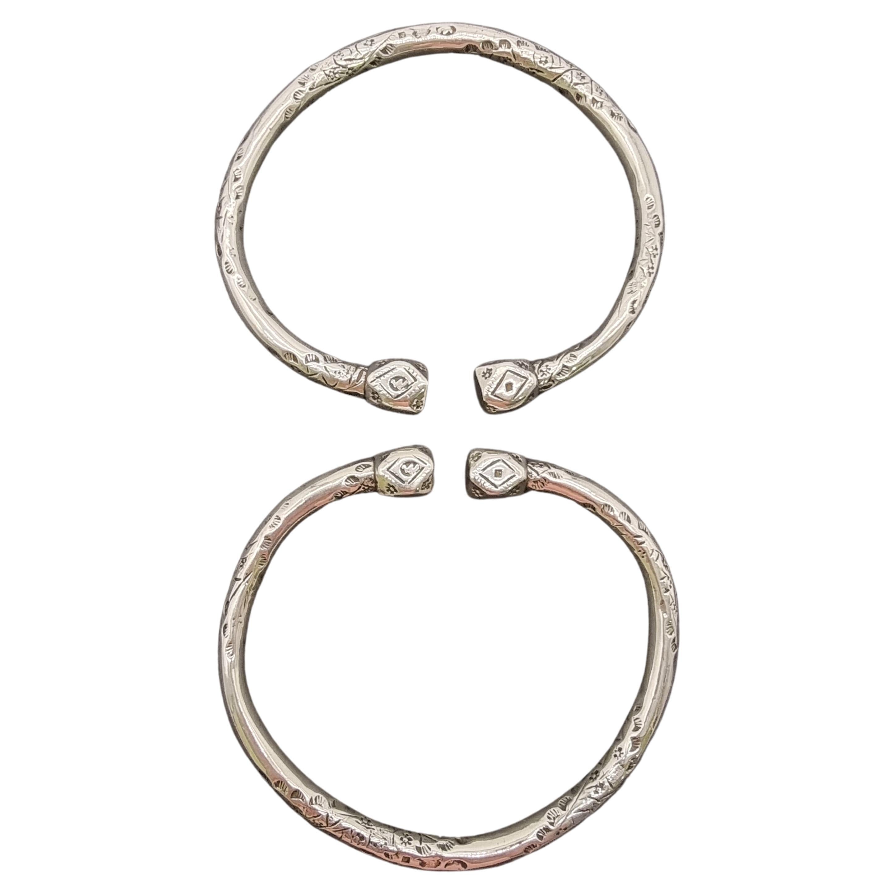 A pair of 19th century Portuguese solid silver arm bracelets