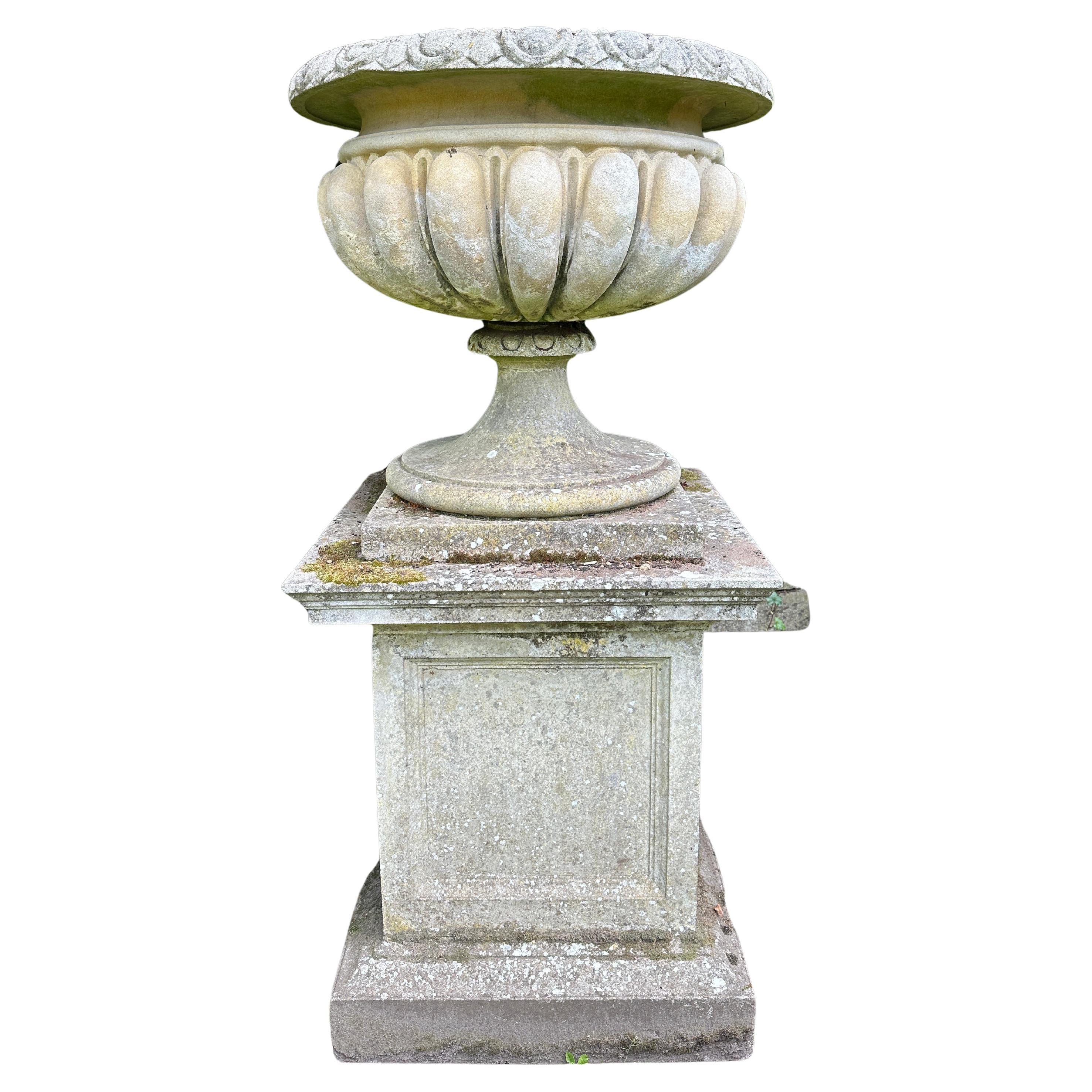 A Very large And Substantial English Stone Urn And Pedestal