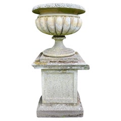 A Very large And Substantial English Stone Urn And Pedestal